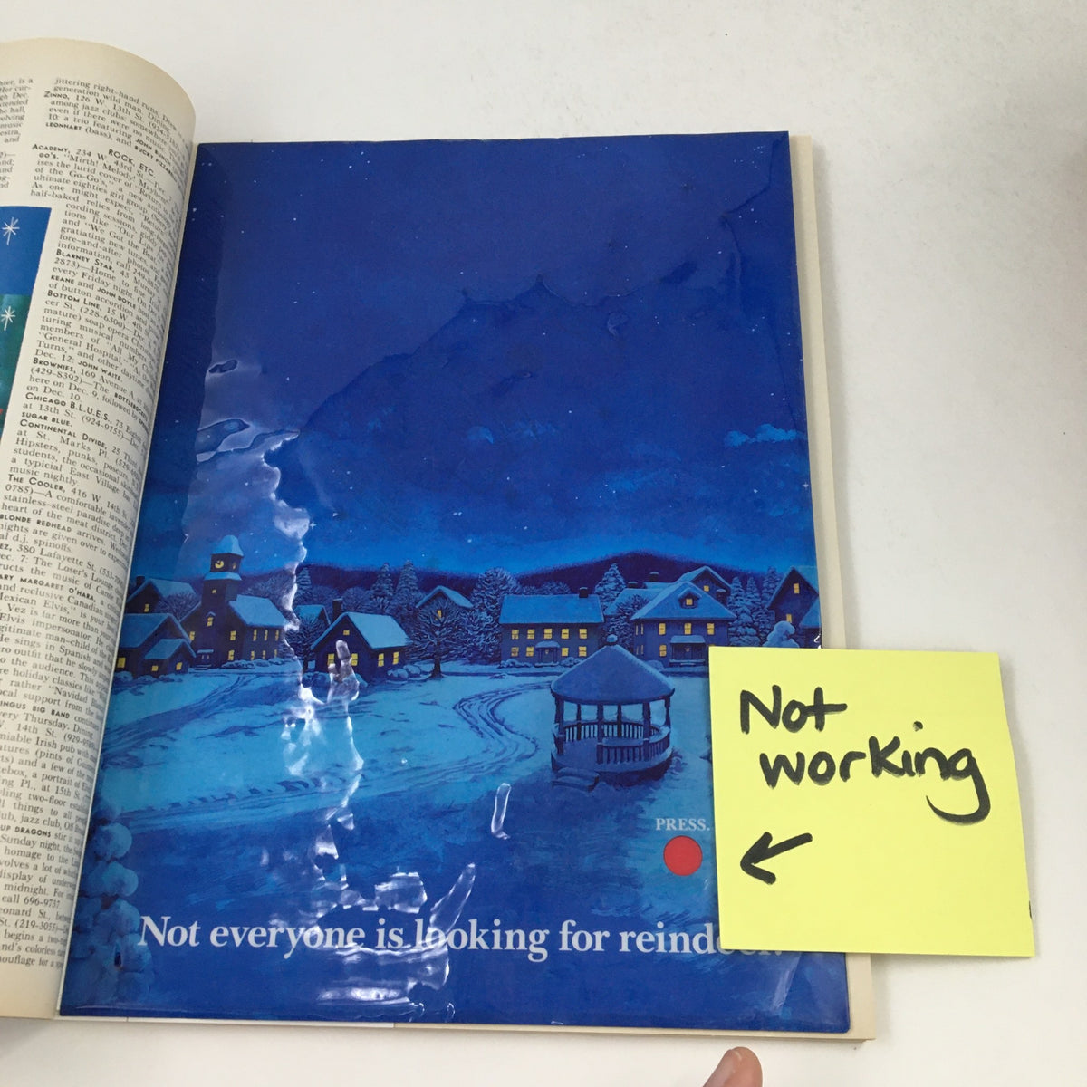 The New Yorker December 12 1994 magazine page showing a holiday-themed illustration with a broken press button. The page reads 'Not everyone is looking for reindeer' and is marked 'Not working,' emphasizing the condition of the Chivas Regal press button.