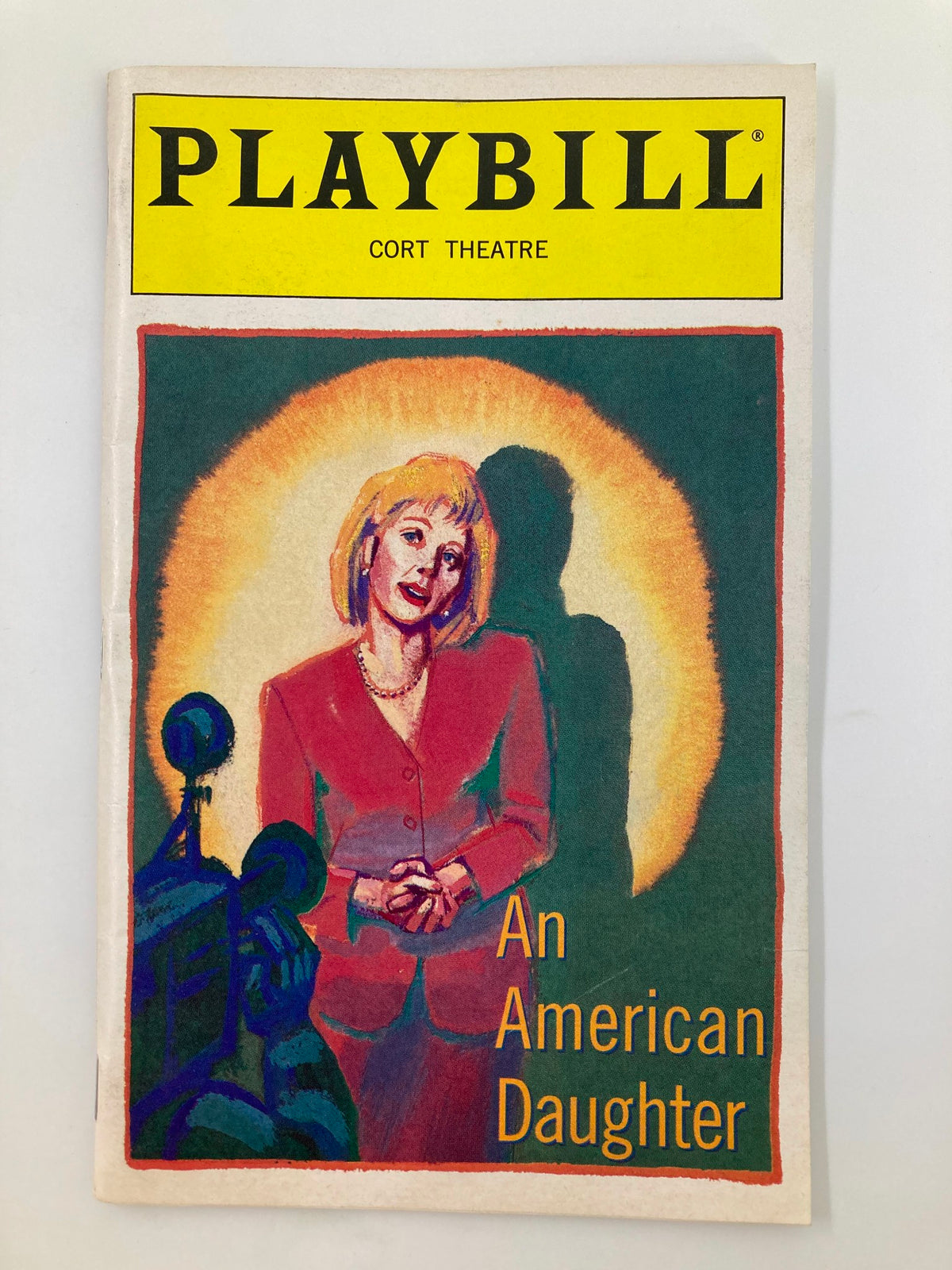 1997 Playbill for 'An American Daughter' at the Cort Theatre featuring a colorful illustration on the cover. This collectible highlights performances by Peter Benson and Elizabeth Marvel.