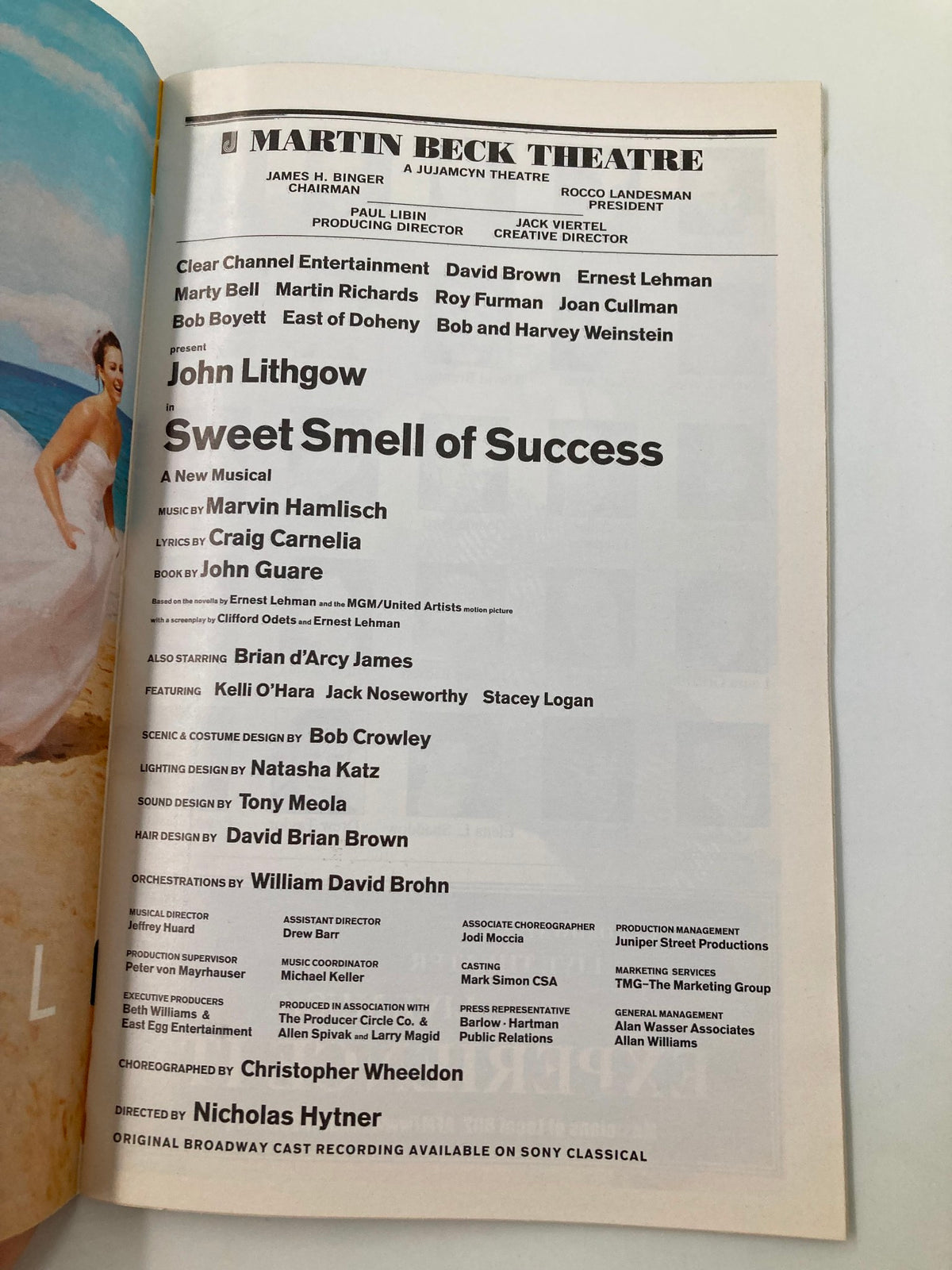 Inside page of the 2002 Playbill from the Martin Beck Theatre for 'Sweet Smell of Success', listing cast members including John Lithgow and production credits.