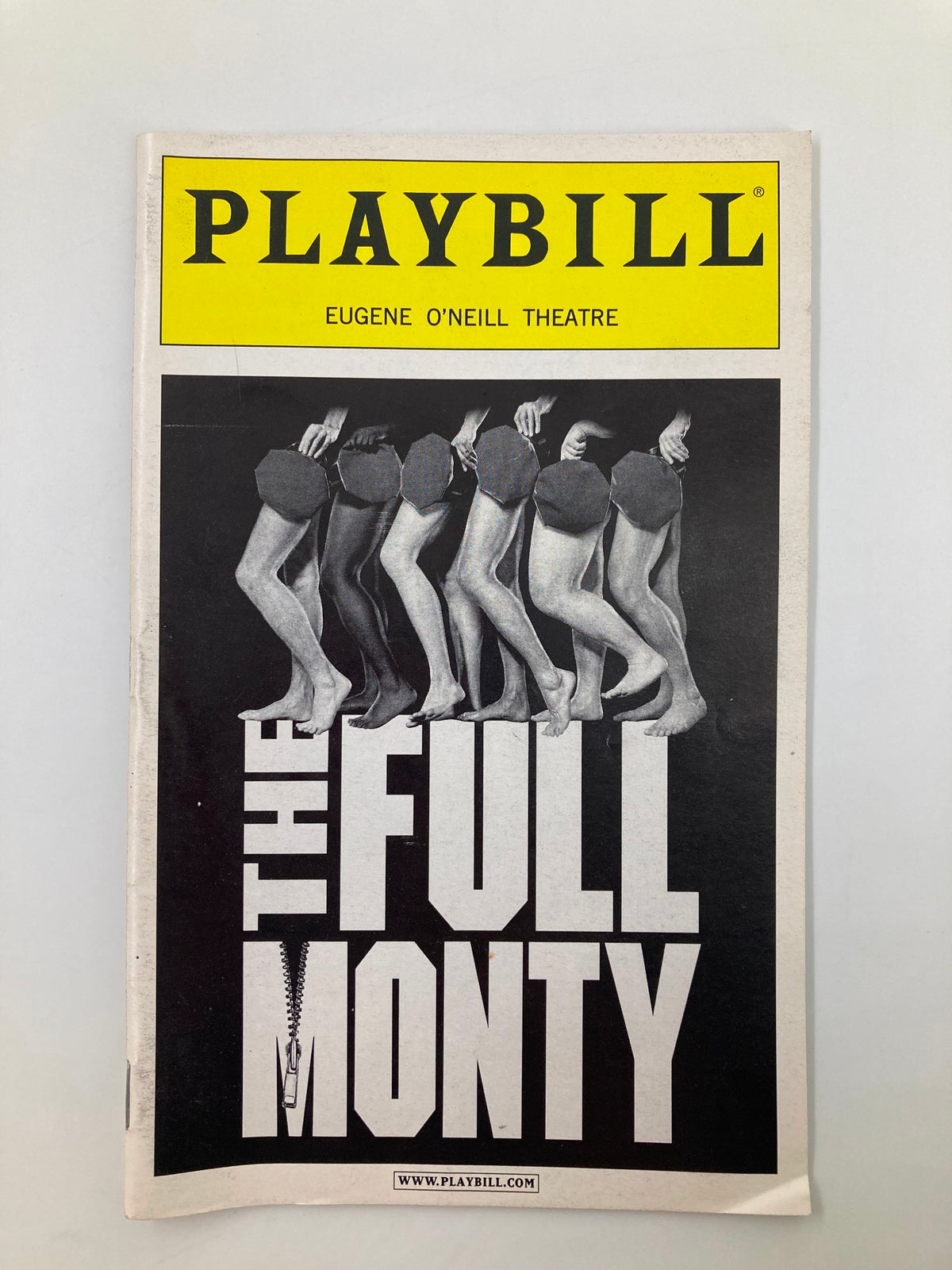 2002 Playbill for The Full Monty at the Eugene O'Neill Theatre featuring a striking cover design with legs and the title prominently displayed.