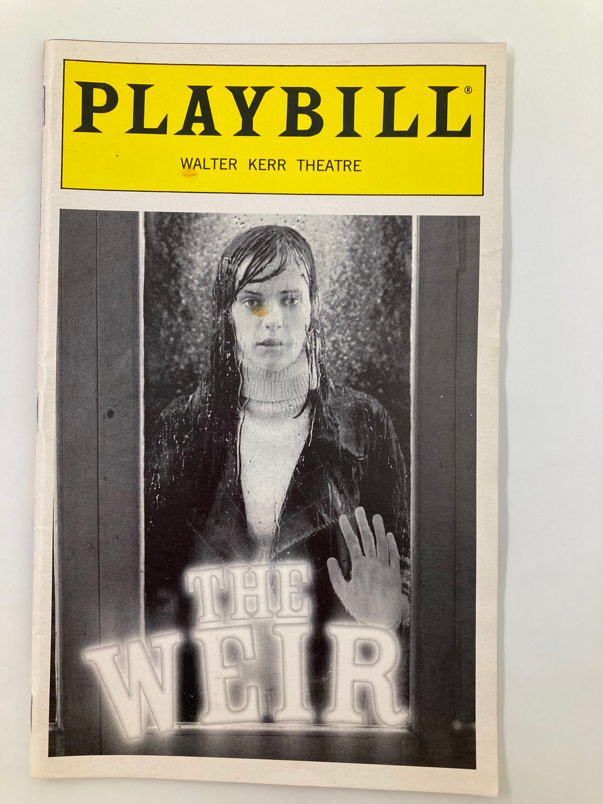 1999 Playbill for The Weir at Walter Kerr Theatre featuring a striking cover design with a dramatic image representing the play.