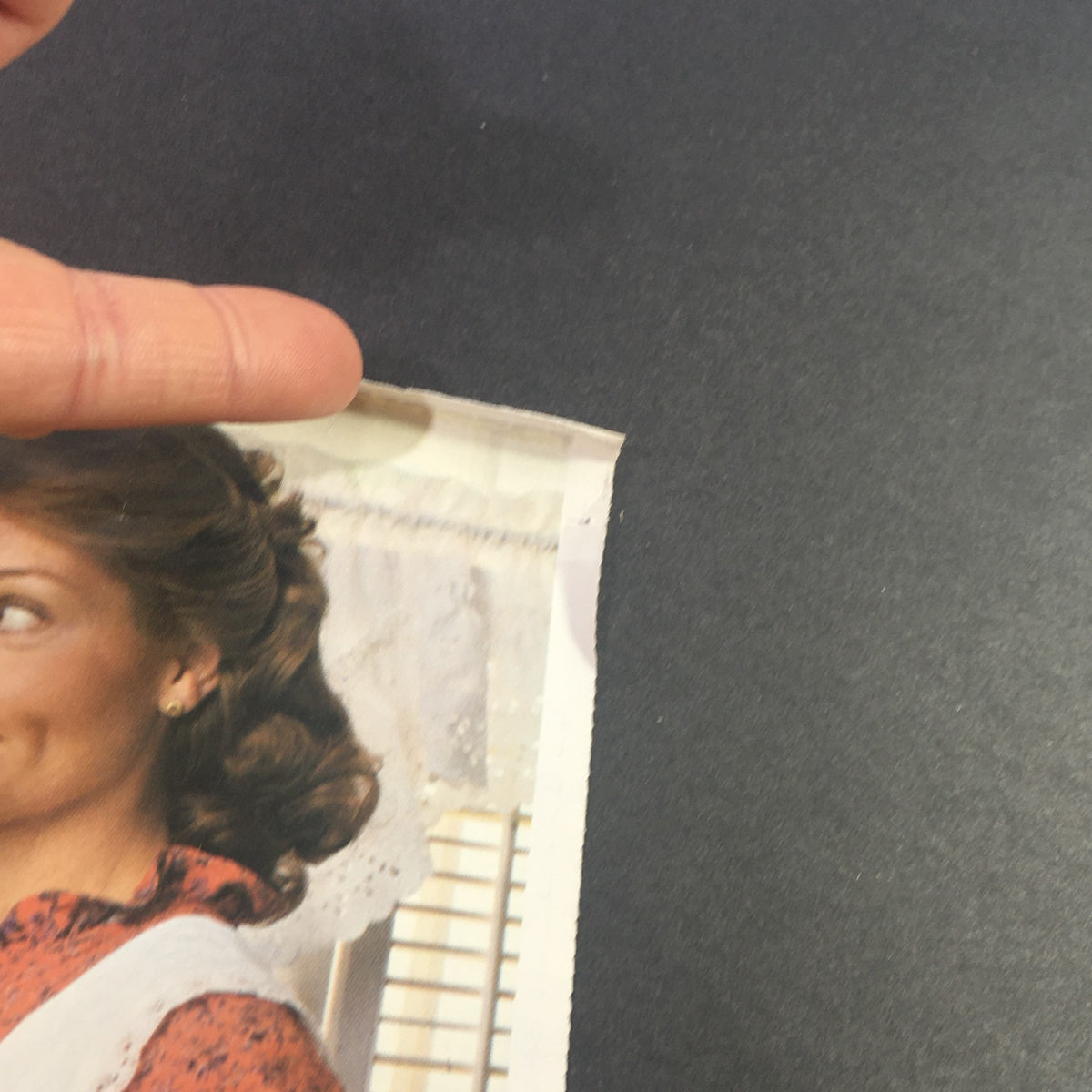 Close-up image of a woman from the VTG 1981 Butterball Li'L Small-Sized Stuffed Turkey Print Ad, focusing on her hairstyle and a section of the advertisement.