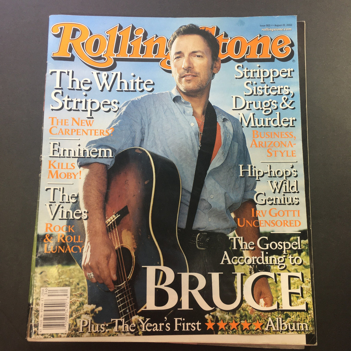 Cover of Rolling Stone Magazine Issue 903 from August 22, 2002 featuring Bruce Springsteen. The magazine highlights articles on various topics from the early 2000s, showcasing the legendary musician on the cover.