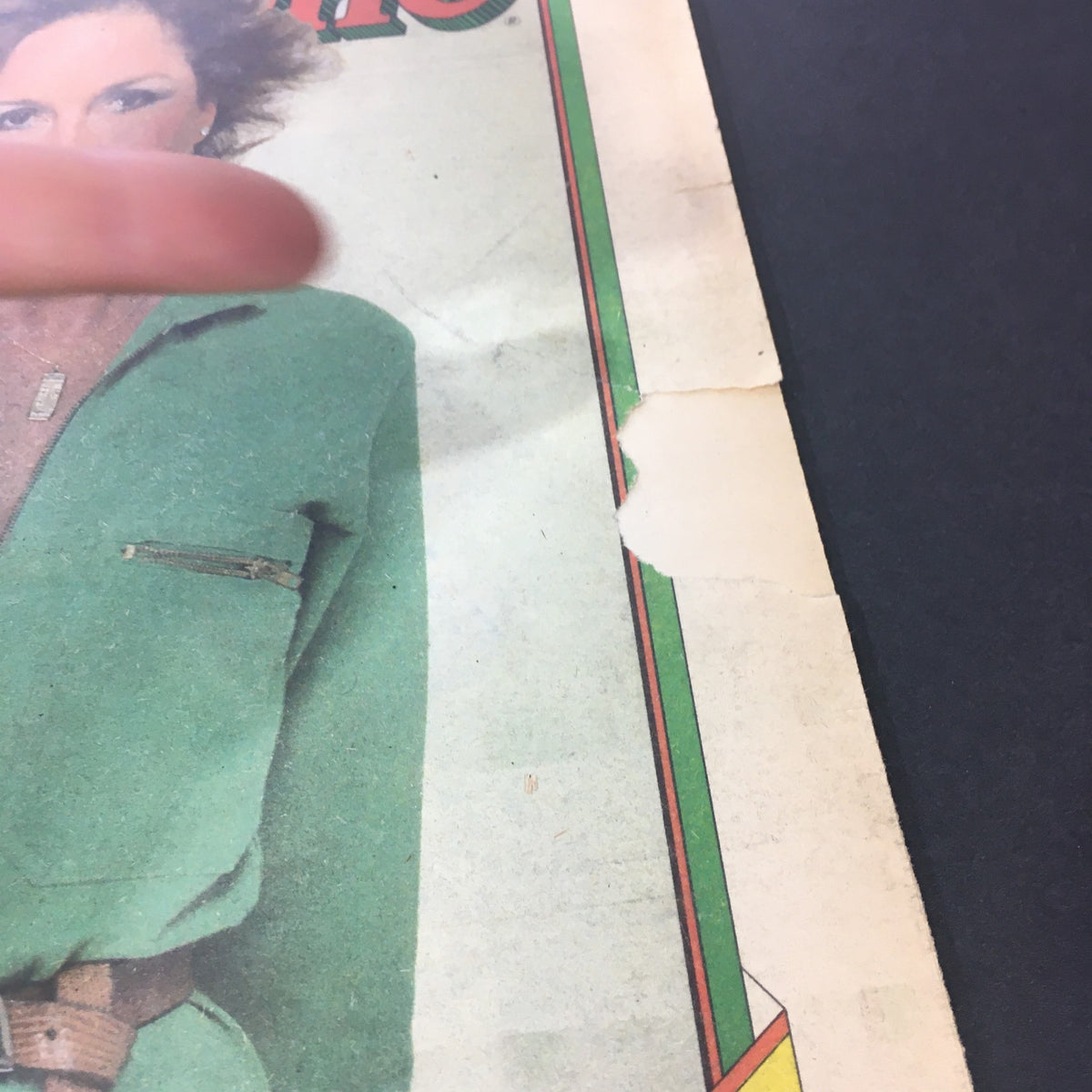 Close-up detail of the VTG Rolling Stone Magazine cover dated November 13, 1980, showing wear and a torn edge, highlighting Joni Mitchell.