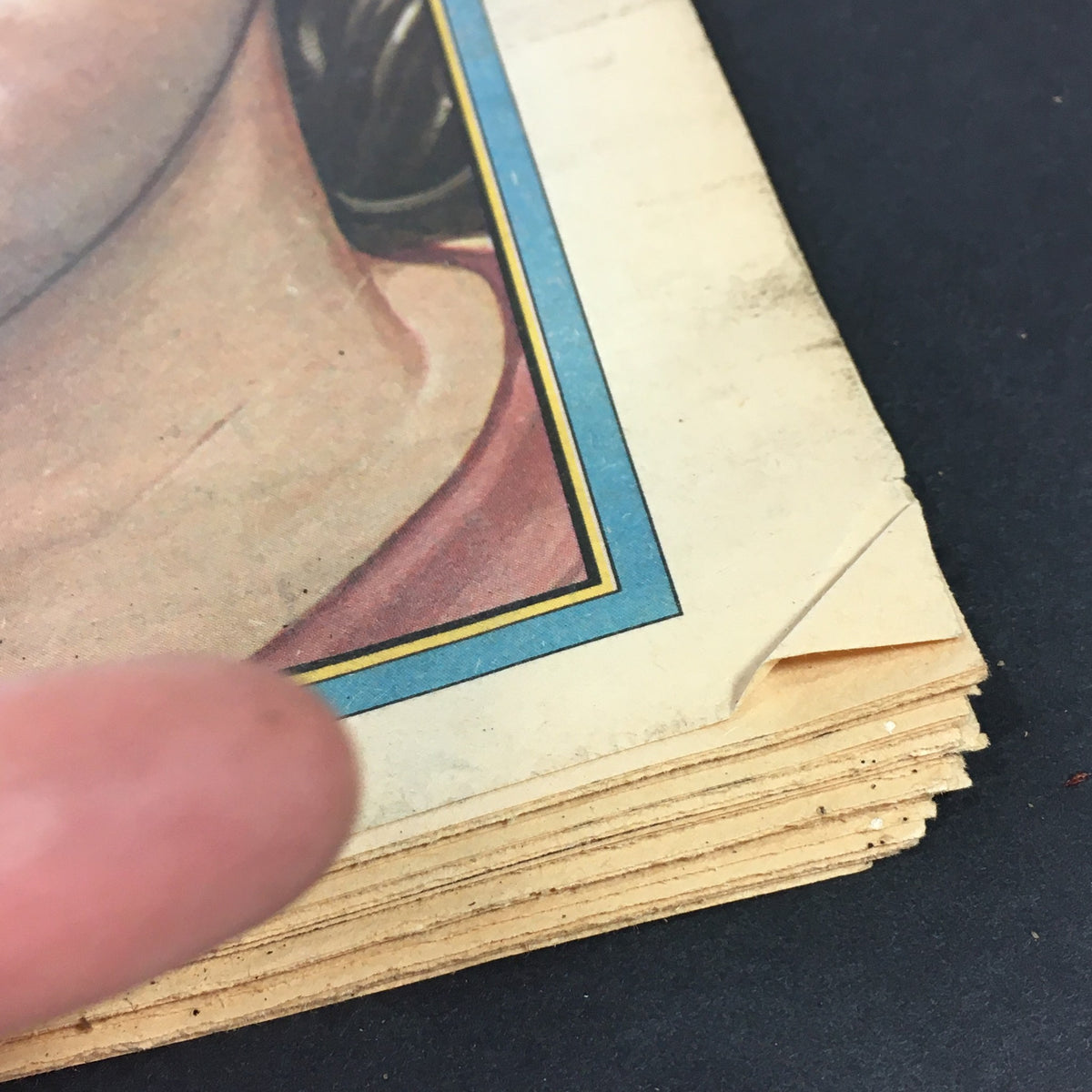 Close-up of the edge of the VTG Rolling Stone Magazine July 12 1979 showing wear and tear typical for a vintage collectible.