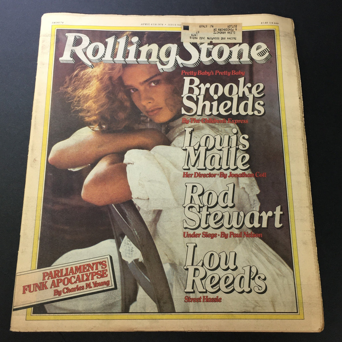 Vintage Rolling Stone Magazine cover from April 6, 1978, featuring Brooke Shields and Louis Malle, highlighting their contributions to pop culture. The cover includes additional mentions of Rod Stewart and Lou Reed, showcasing the vibrant spirit of the late 1970s.