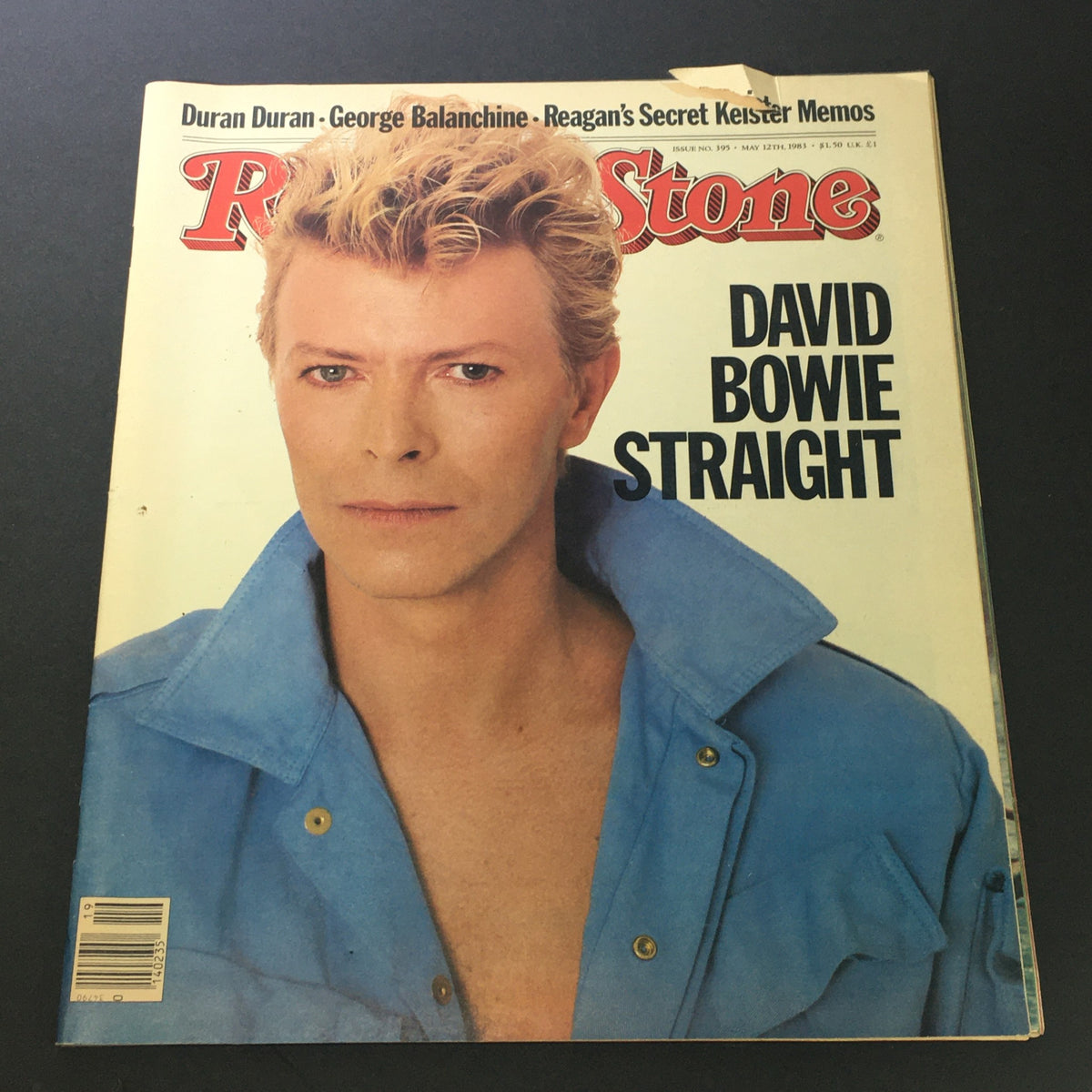 Cover of VTG Rolling Stone Magazine May 12, 1986 featuring David Bowie in a blue outfit, highlighting his iconic look from the 1980s.