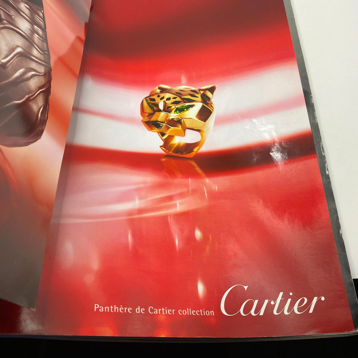 V Magazine Summer 2005 No. 35 - Advertisement page for Cartier's Panthère de Cartier collection, showcasing a striking gold ring against a vibrant background.
