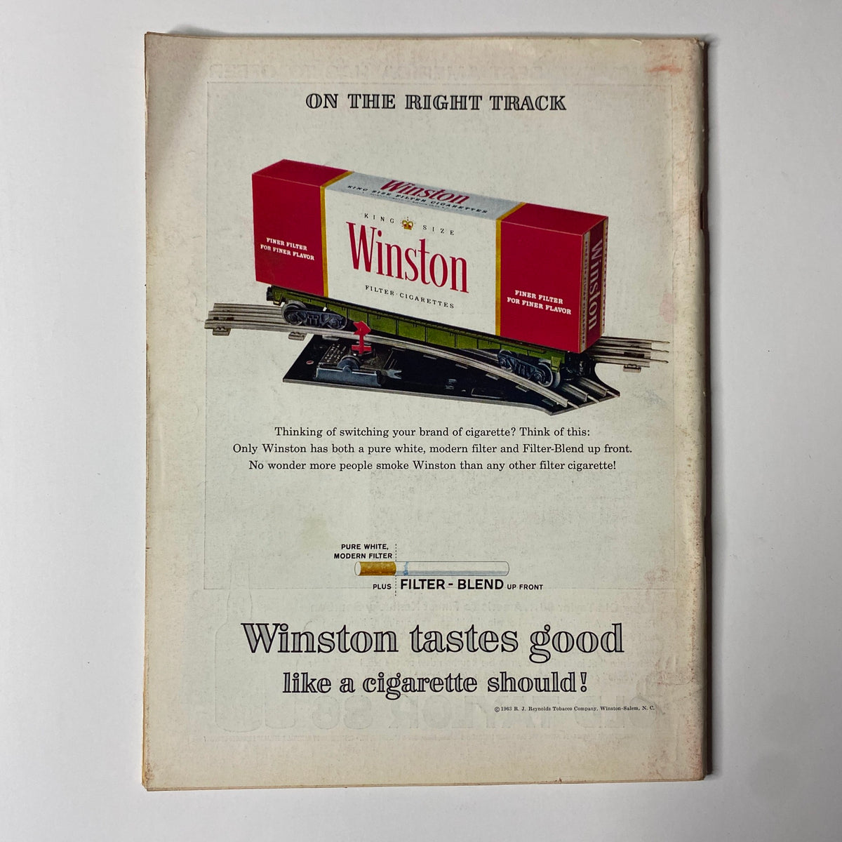 Back cover advertisement for Winston Filter Cigarettes in Time Magazine, emphasizing modern filter technology.