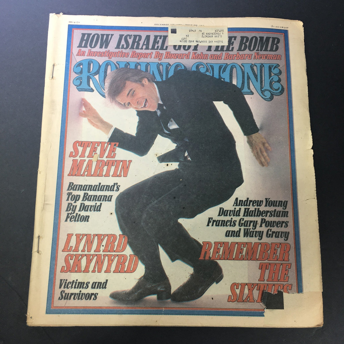 Cover of Rolling Stone Magazine from December 1, 1977 featuring Steve Martin and Lynyrd Skynyrd. The cover includes the headline 'Lynyrd Skynyrd: Victims and Survivors' and an article title about Steve Martin. The magazine showcases vintage design elements and is a significant collectible item.