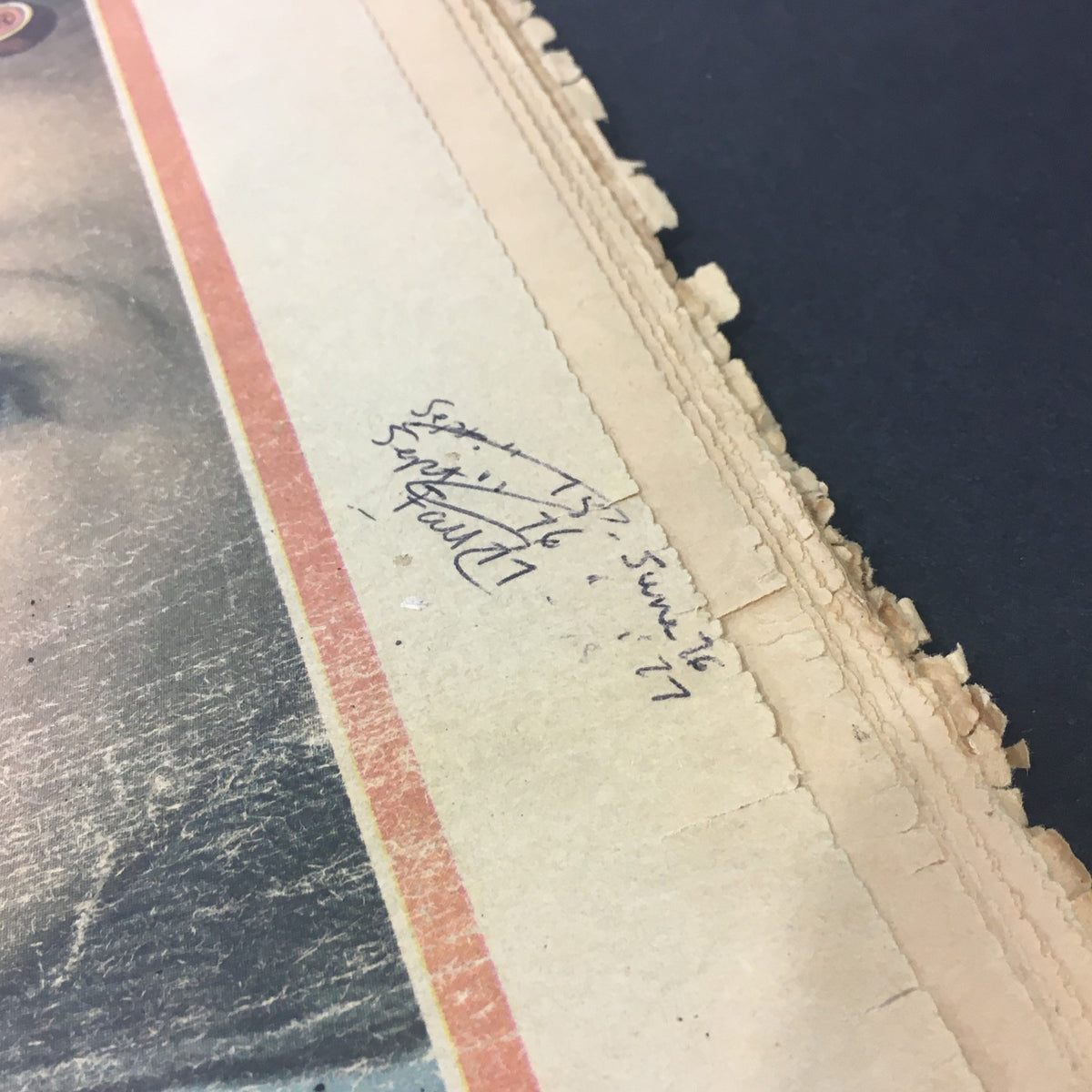 Close-up of the edge of VTG Rolling Stone Magazine May 23 1974 showing handwritten notes and typical signs of age, emphasizing its collectible value.
