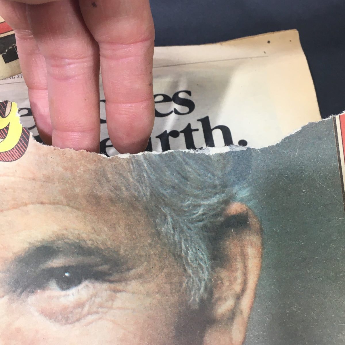 Detail of the torn corner of the cover from the VTG Rolling Stone Magazine March 22 1979, emphasizing the magazine's vintage condition and character.