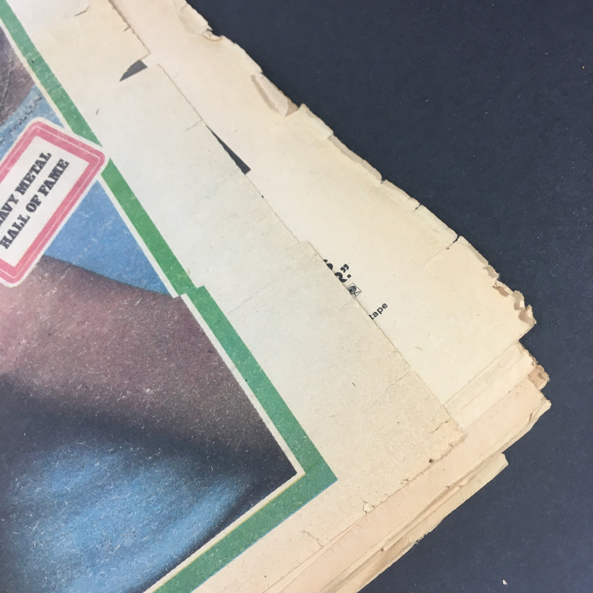 Side view of the pages of the Rolling Stone magazine July 4 1974 featuring Jane Fonda, highlighting the noticeable wear and damage on the edges.