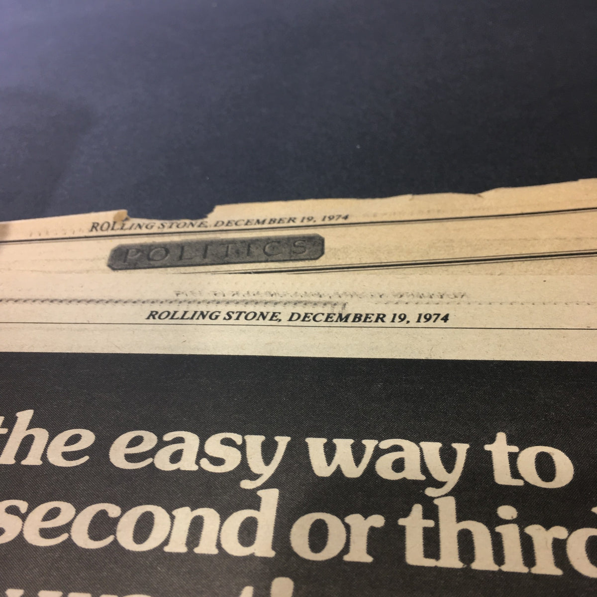 Close-up of interior pages of VTG Rolling Stone Magazine December 19 1974 featuring the date and article header.