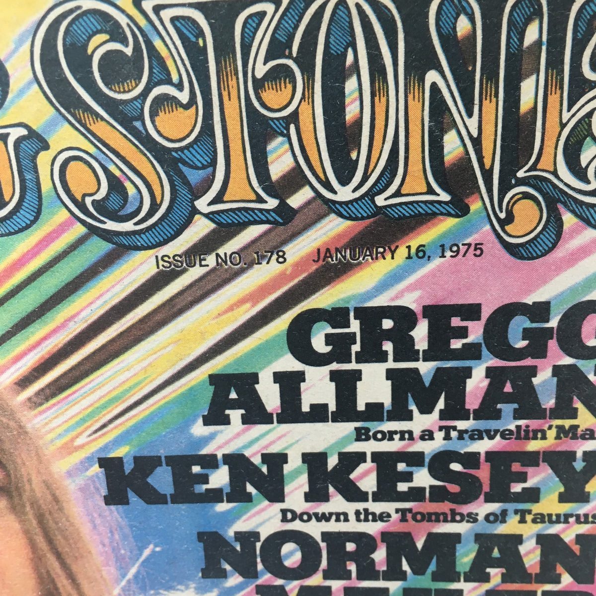 Close-up of the cover of Vintage Rolling Stone Magazine January 16 1975, highlighting the title and names of featured artists Gregg Allman and Ken Kesey.