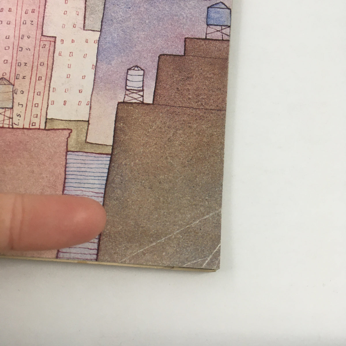 Close-up of the front cover details of The New Yorker Full Magazine April 27 1981 by Lonni Sue Johnson, highlighting the textured buildings and water towers.