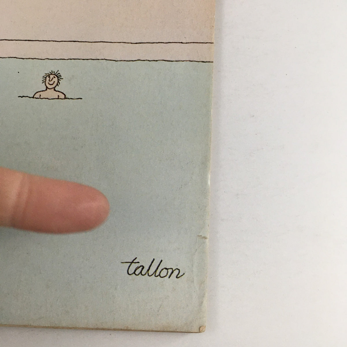 Detail of The New Yorker Magazine July 20, 1981 cover, highlighting the signature 'tallon' beneath a figure swimming, representing iconic vintage art.