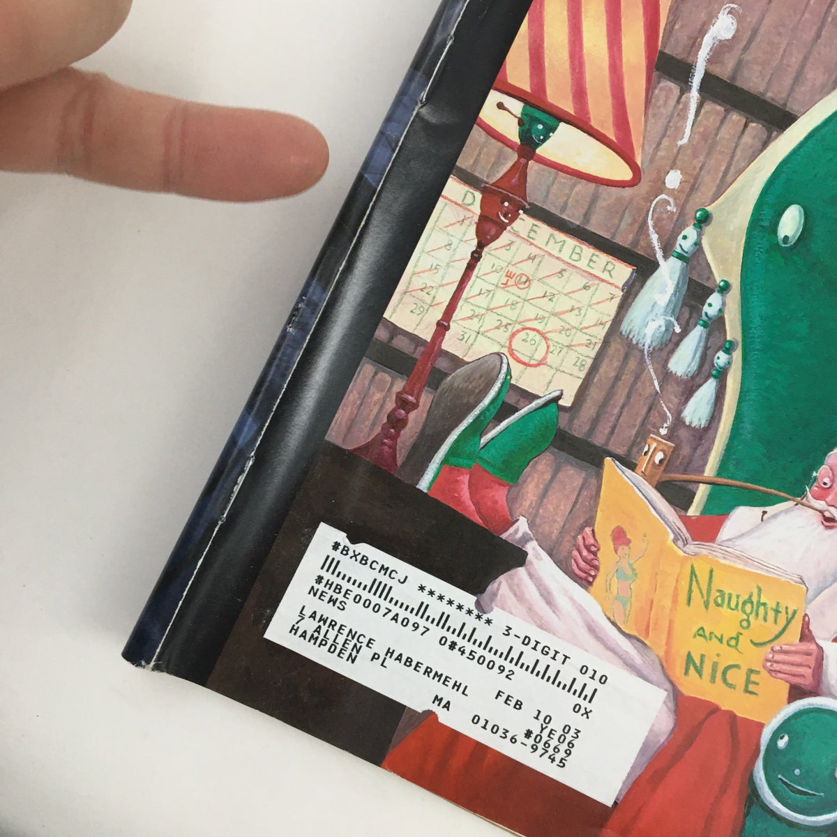 Close-up detail of The New Yorker December 24 2001 magazine cover showing the address label and price sticker, showcasing part of the unique design and vintage elements of the cover artwork.
