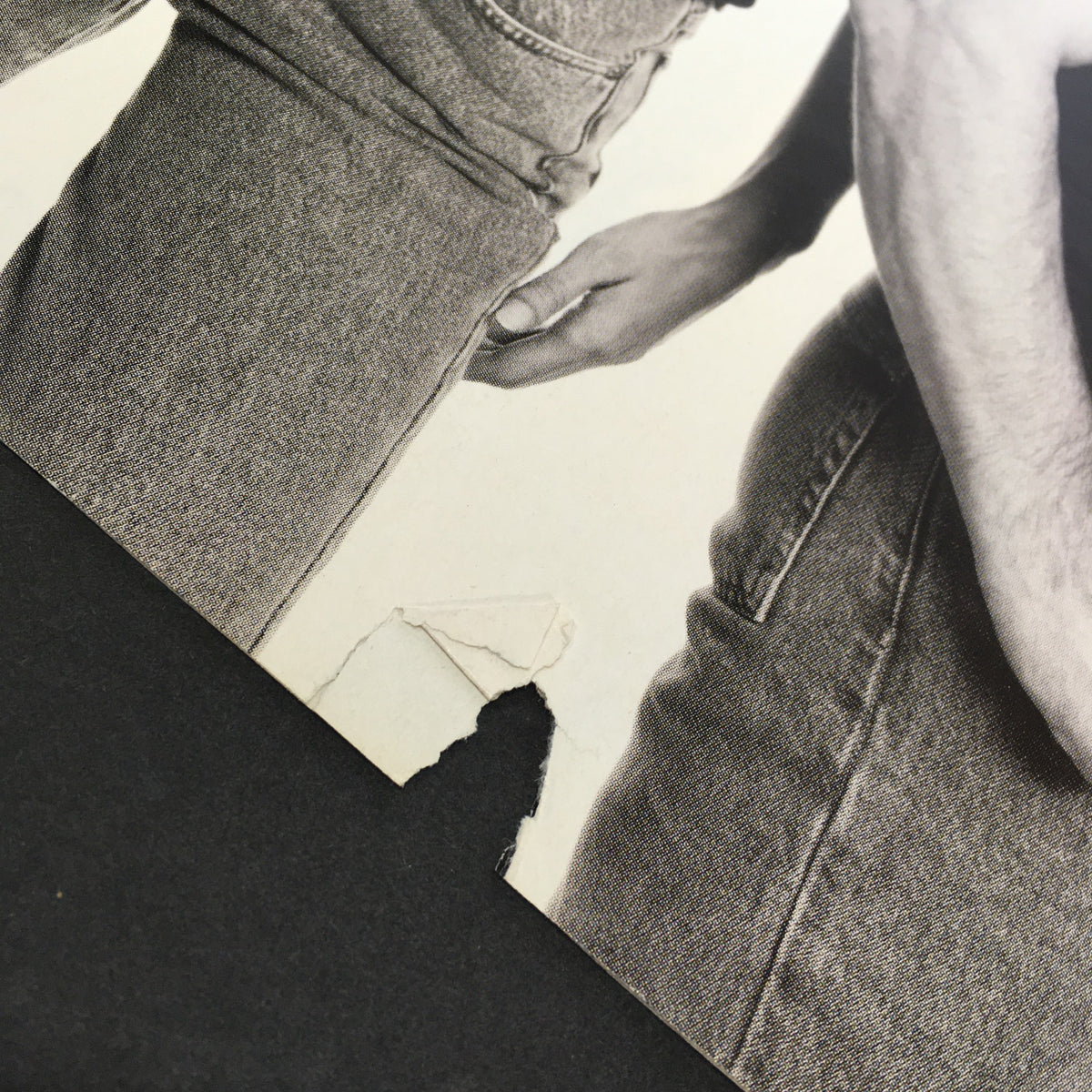 Close-up of a vintage Rolling Stone Magazine from December 14, 1995, showing wear on the edge, highlighting the collectible nature of the item featuring Mick Jagger.