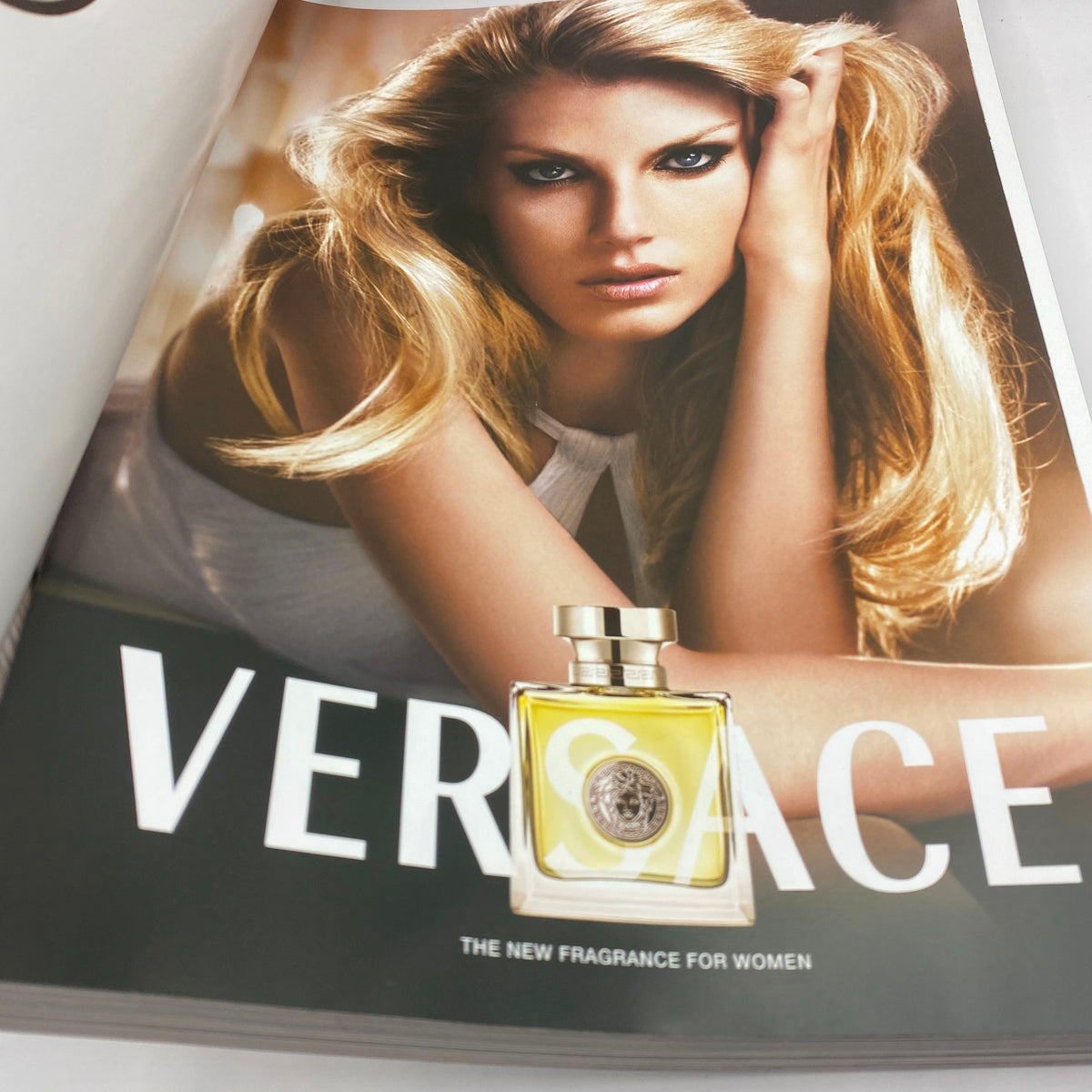 Marie Claire Italy Magazine April 2007 Bianca Balti Cover featuring an advertisement for Versace, showcasing the fragrance for women with a model prominently displaying the perfume.