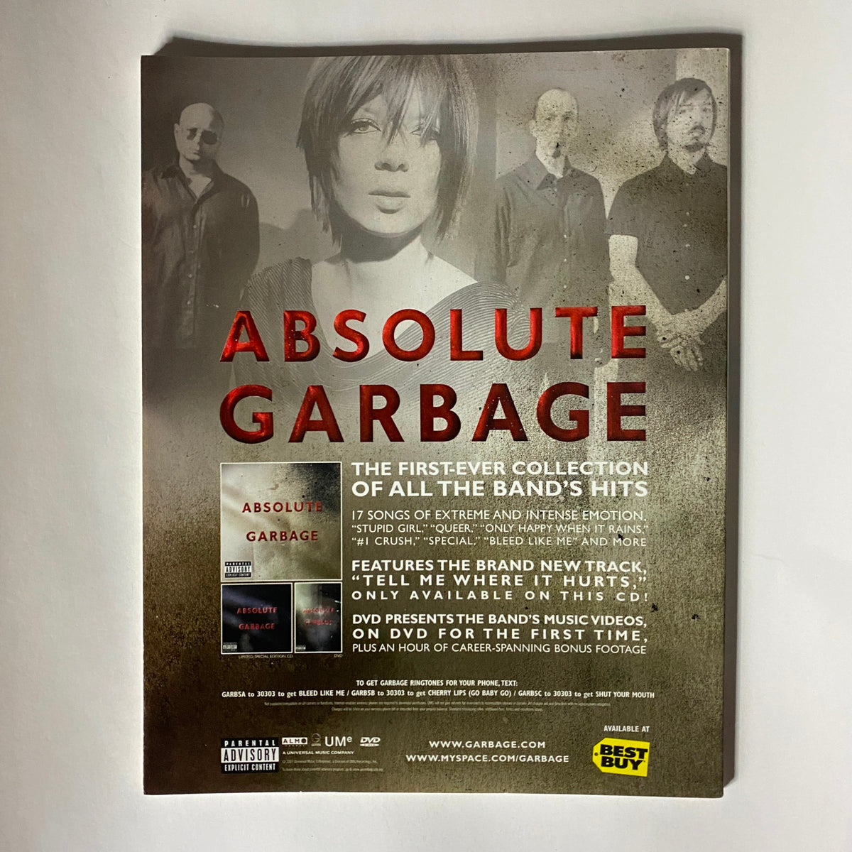 Back cover of Bust Magazine August 2007 featuring Amy Winehouse, showcasing the band Absolute Garbage, highlighting music hits and DVD features.