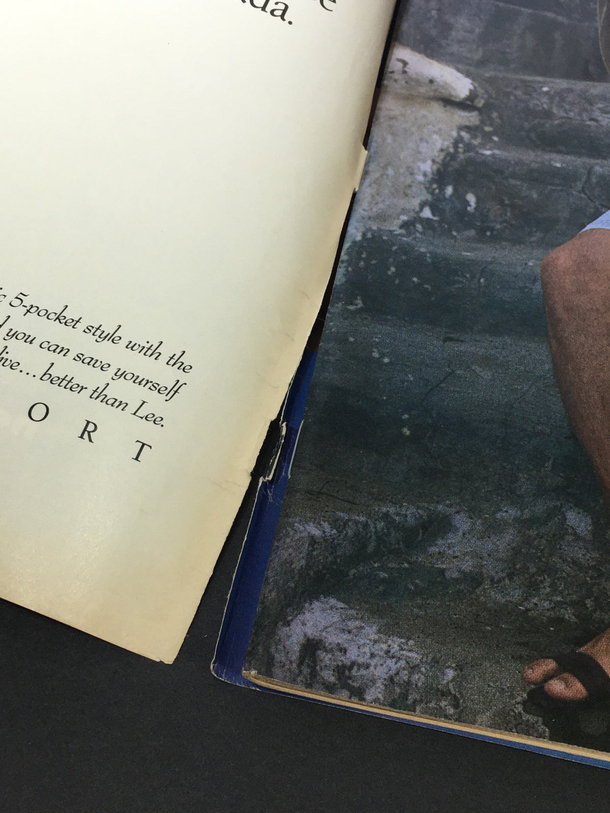 Close-up view of the spine and edge of the vintage Rolling Stone Magazine from March 19, 1992, highlighting its used condition with signs of wear, part of a collectible edition featuring Mike Myers and Dana Carvey.