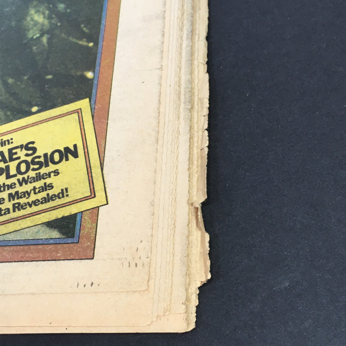 Close-up of the edge of the VTG Rolling Stone Magazine September 11 1975, highlighting the condition and unique address label of the vintage publication.