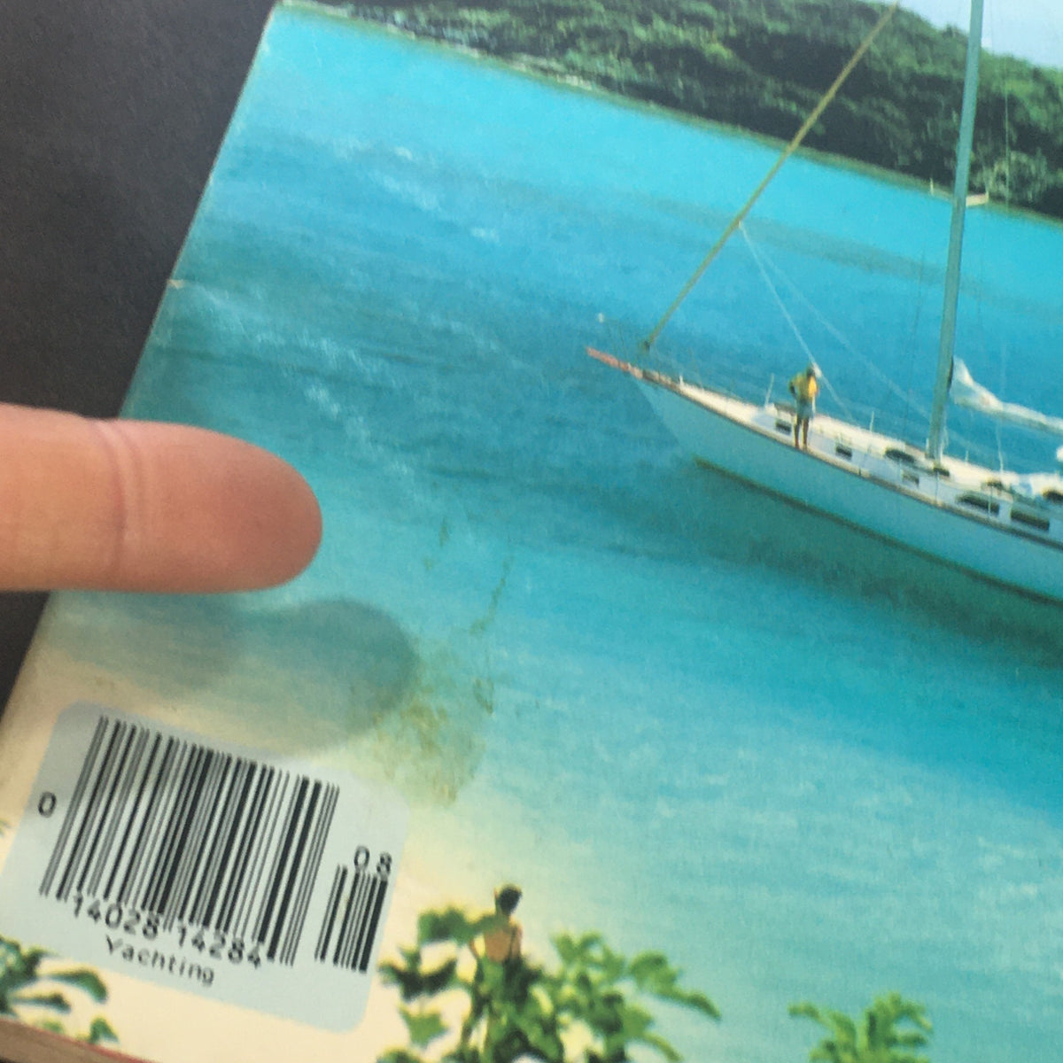 Cover detail of VTG Yachting Magazine August 1978 showcasing a beautiful turquoise sea with a sailboat, perfect for collectors interested in vintage yachting history.