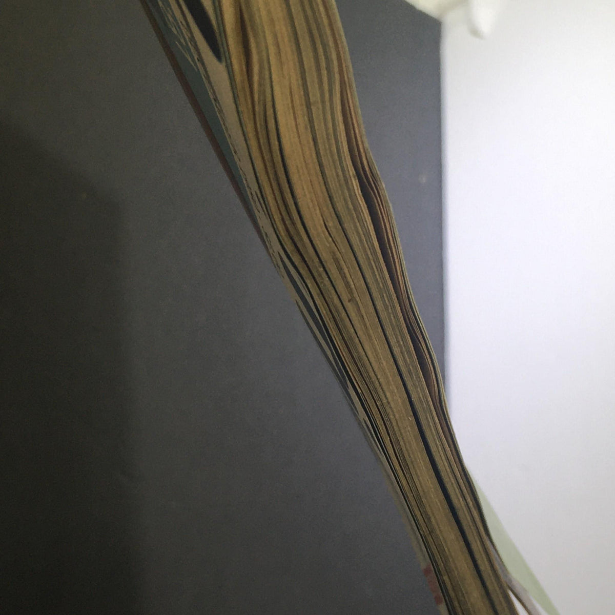 Side view of Yachting Magazine December 1980 showcasing its aged pages, highlighting the condition and historical significance of this collectible magazine.