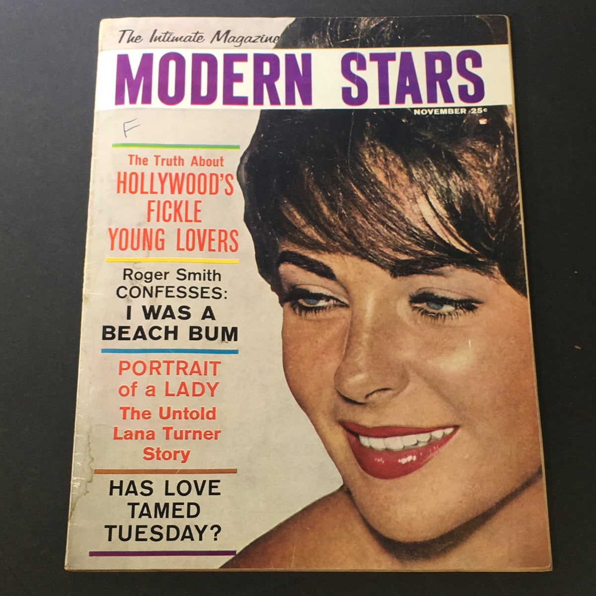 Cover of VTG The Intimate Magazine Modern Stars November 1960 featuring a close-up of a woman's face, highlighting articles on Hollywood's young lovers, Roger Smith's confessions, and the untold story of Lana Turner.