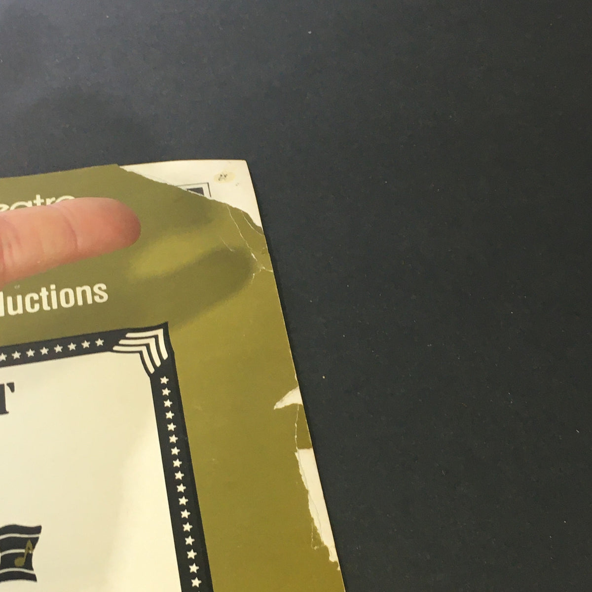 Another angle of the damage on the VTG Front and Rear Music Magazine cover, focusing on the top corner wear, highlighting its vintage condition.