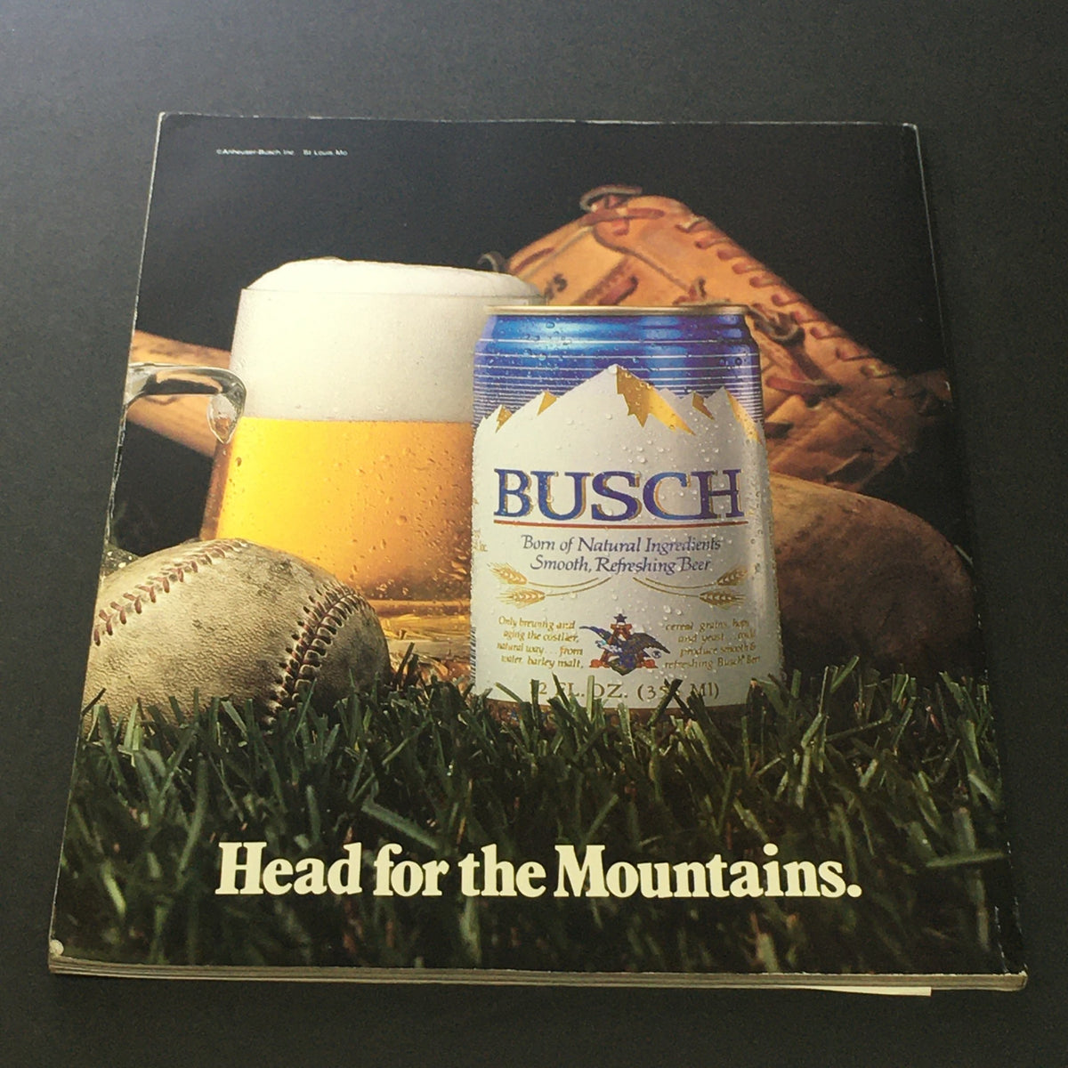 Back cover of the VTG New York Mets Official Yearbook 1986 Revised Edition featuring a Busch beer advertisement with a baseball theme.