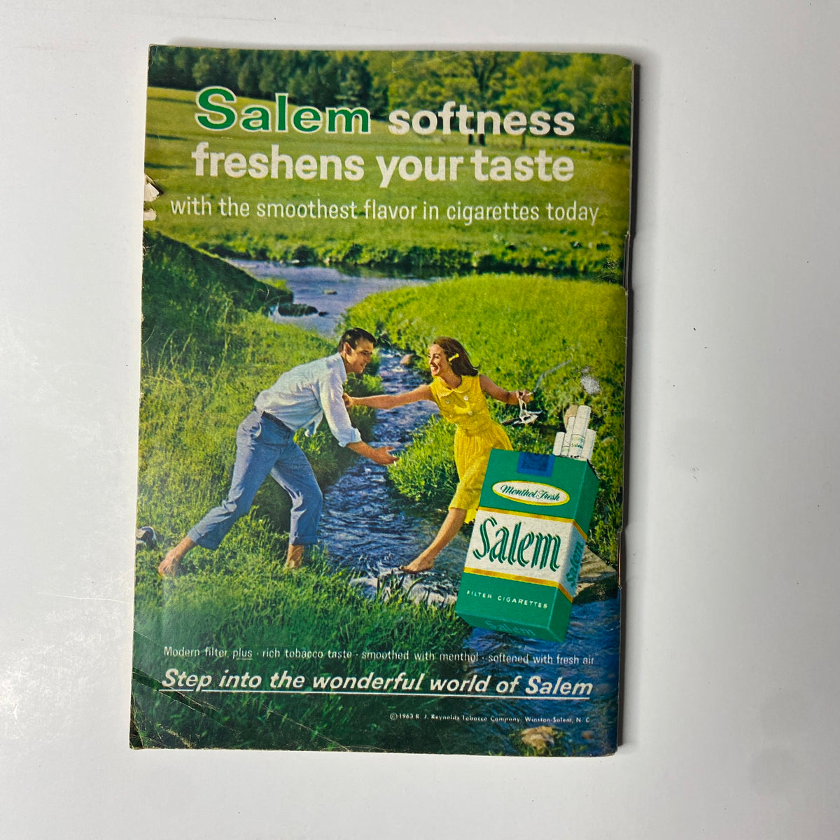 Salem cigarette advertisement featuring a couple in a scenic outdoors setting from TV Guide Magazine January 25, 1964.