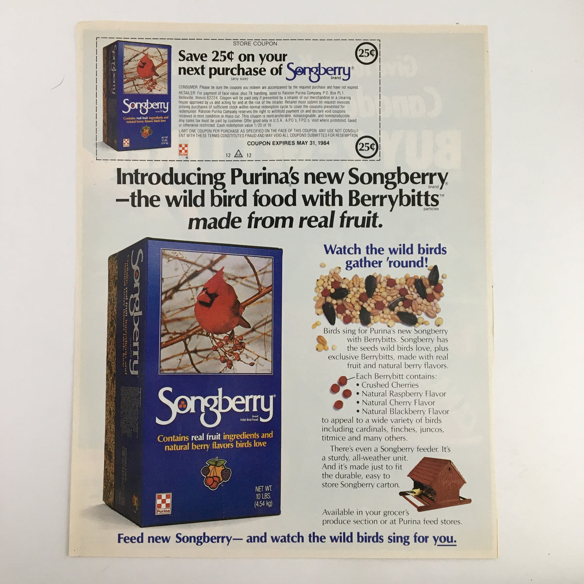 1984 Songberry Advertisement introducing Purina's new Songberry bird food with Berrybits made from real fruit. The image displays the product box and promotional details, emphasizing a 25 cent savings for the next purchase.