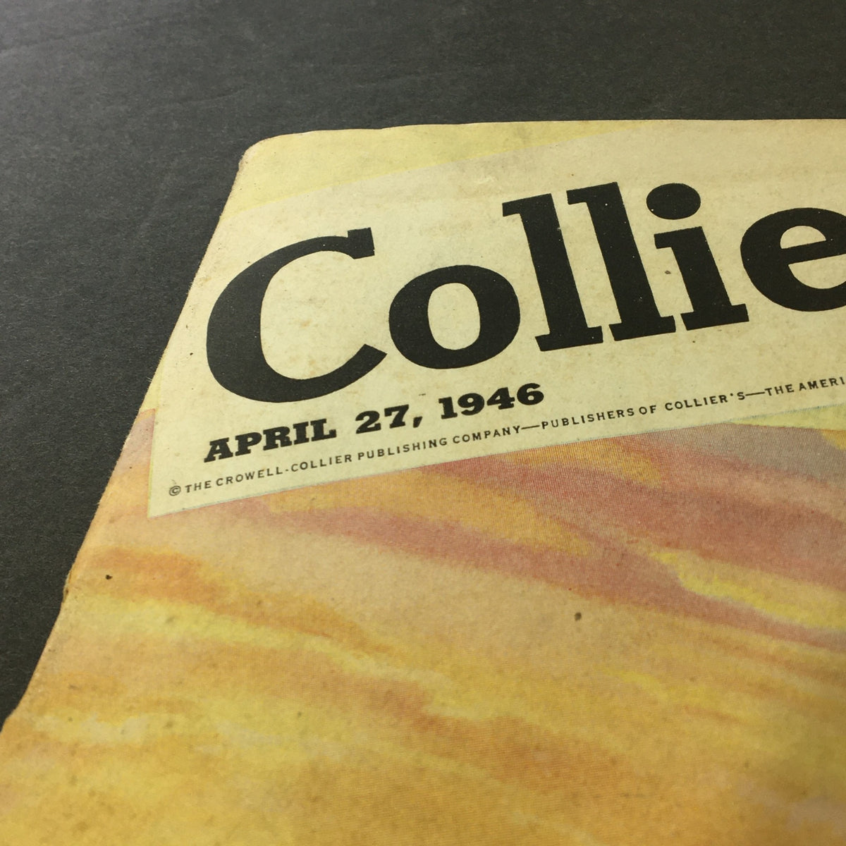 Close-up of the title on the cover of VTG Collier's Magazine April 27 1946 indicating the publication date and title 'Babes in Wall Street' by Lester Velie.
