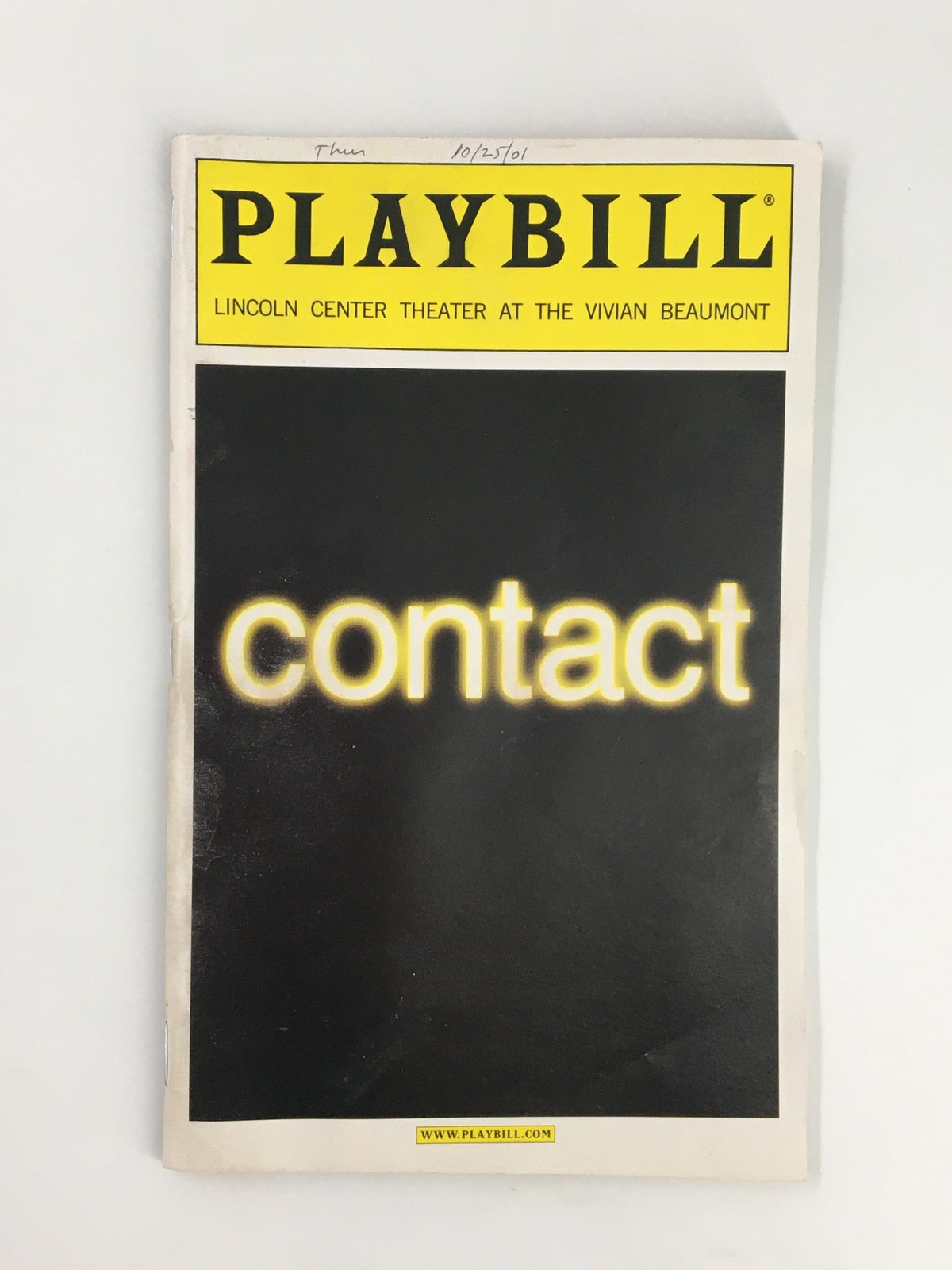 2001 Playbill for Contact at Lincoln Center Theater featuring the title prominently displayed in bold yellow against a black background.