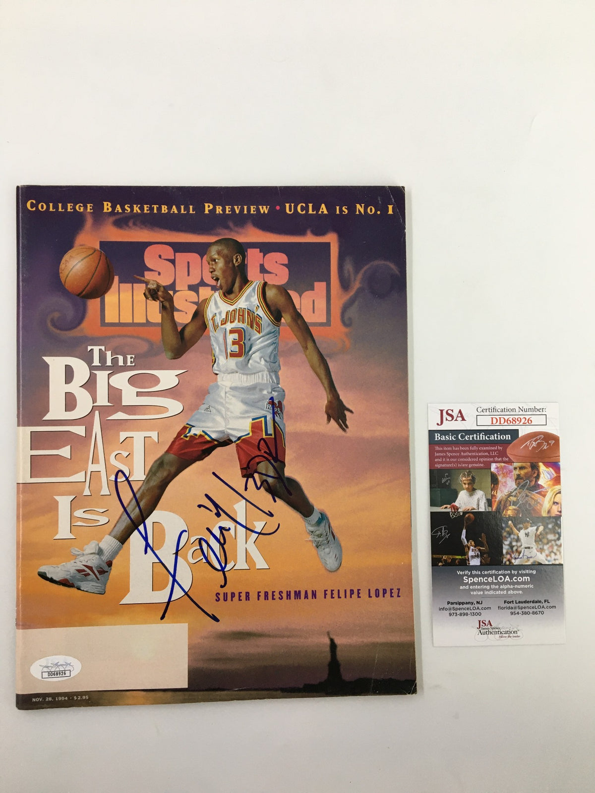 Felipe Lopez Sports Illustrated magazine from November 28, 1994, featuring his autograph and a JSA certification card, showcasing a moment in basketball history.