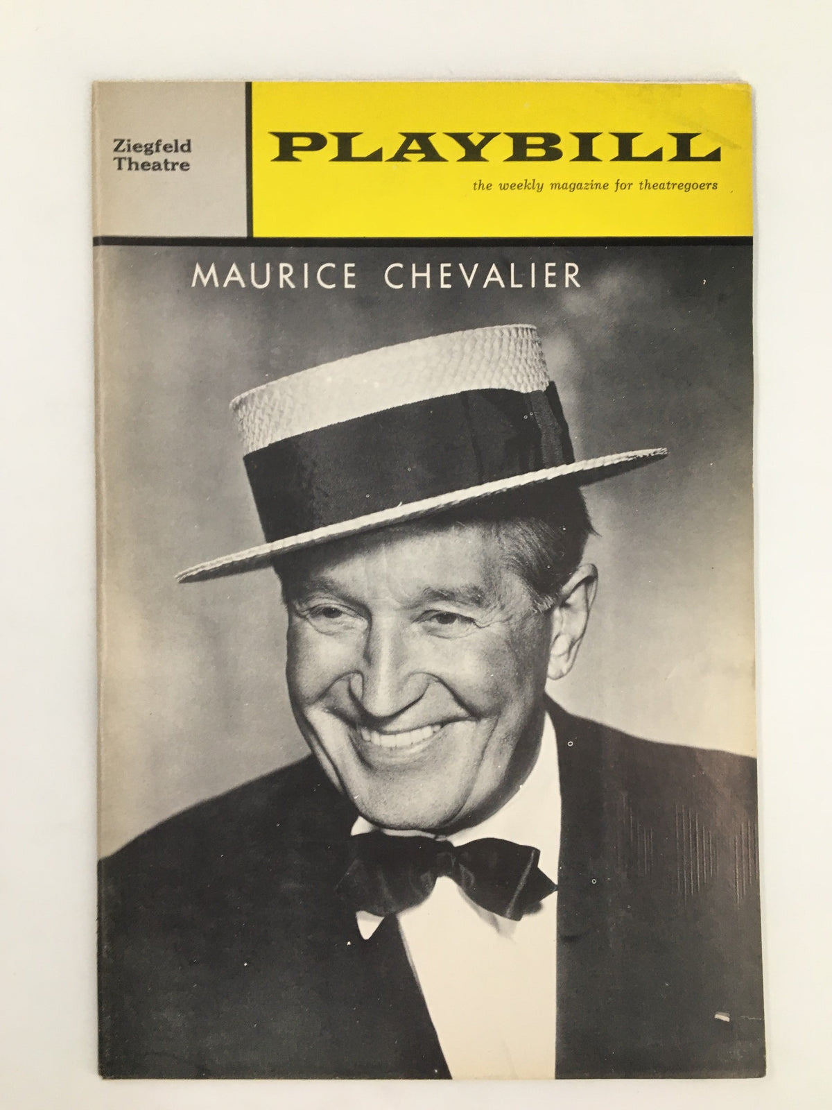 1963 Playbill Ziegfeld Theatre featuring Maurice Chevalier wearing a straw hat and bow tie, showcasing a nostalgic moment from vintage Broadway.