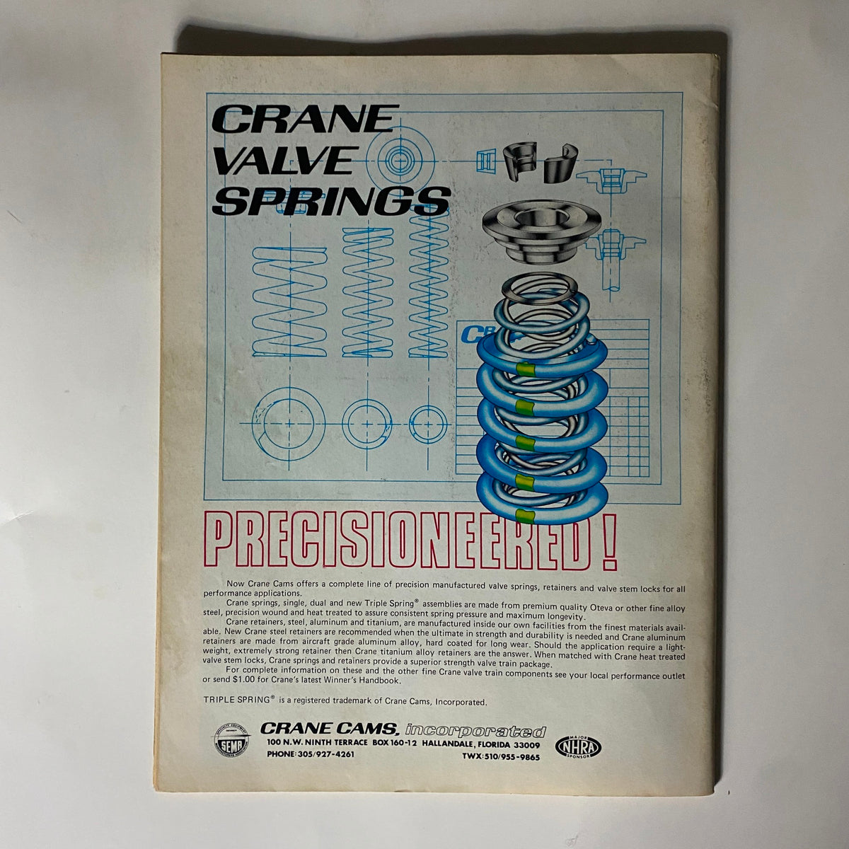 Back cover of Popular Hot Rodding Magazine December 1976 advertising Crane Valve Springs, highlighting precision-engineered components for performance applications.