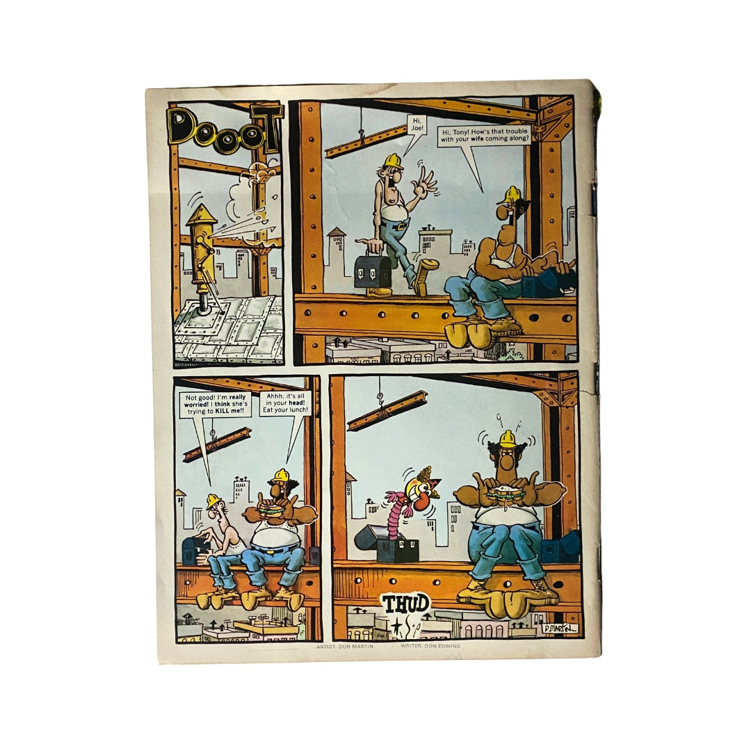 A cartoon panel from Mad Magazine January 1984 No. 244 illustrating a humorous construction site scene by Don Martin, featuring exaggerated characters and a playful narrative.