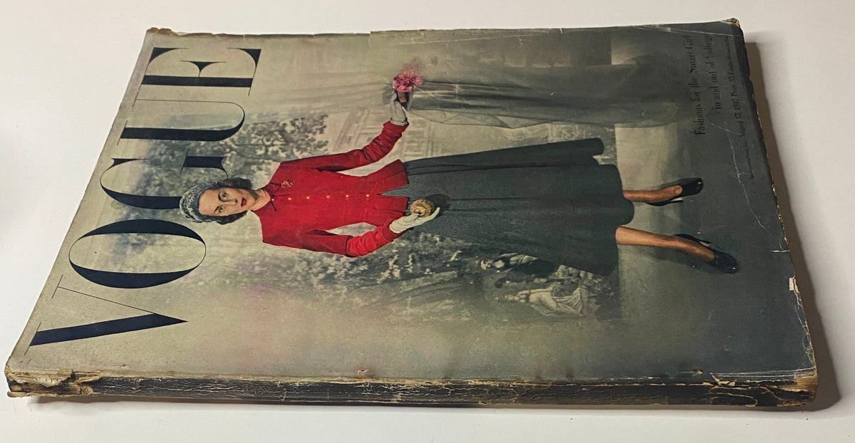 Side view of the August 15, 1947 Vogue Magazine cover featuring model Joan Petit in a red jacket and gray skirt, celebrating youth and elegance in fashion.
