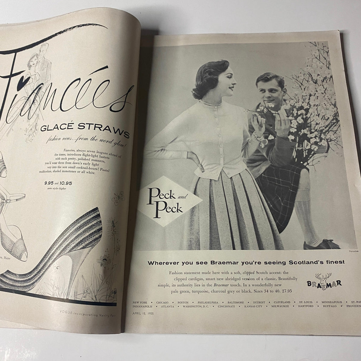 Advertisement in Vogue Magazine April 15, 1955 showcasing Braemar fashion products with a stylish couple posing.
