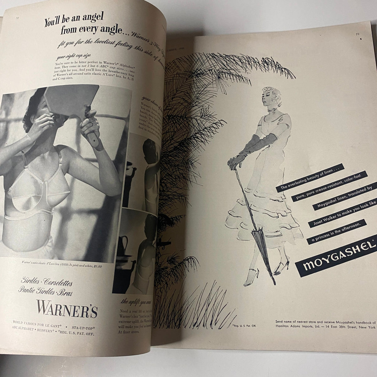 Duplicate image of a vintage fashion illustration featuring a lady with an umbrella from Vogue Magazine December 1948 Christmas Issue.