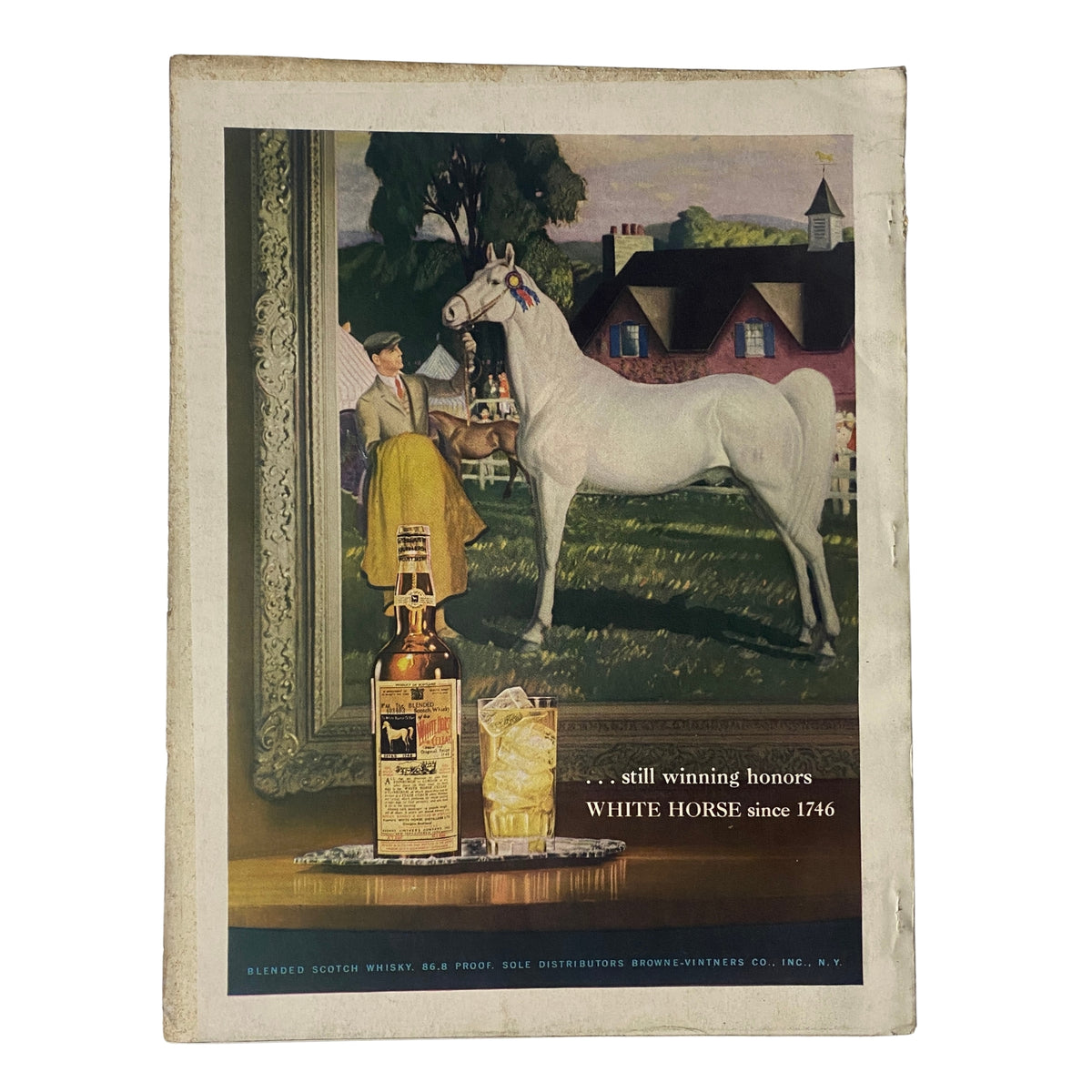 Back cover of Vogue Magazine November 1, 1952, showcasing an advertisement for White Horse whiskey, featuring artwork of a woman with a horse.