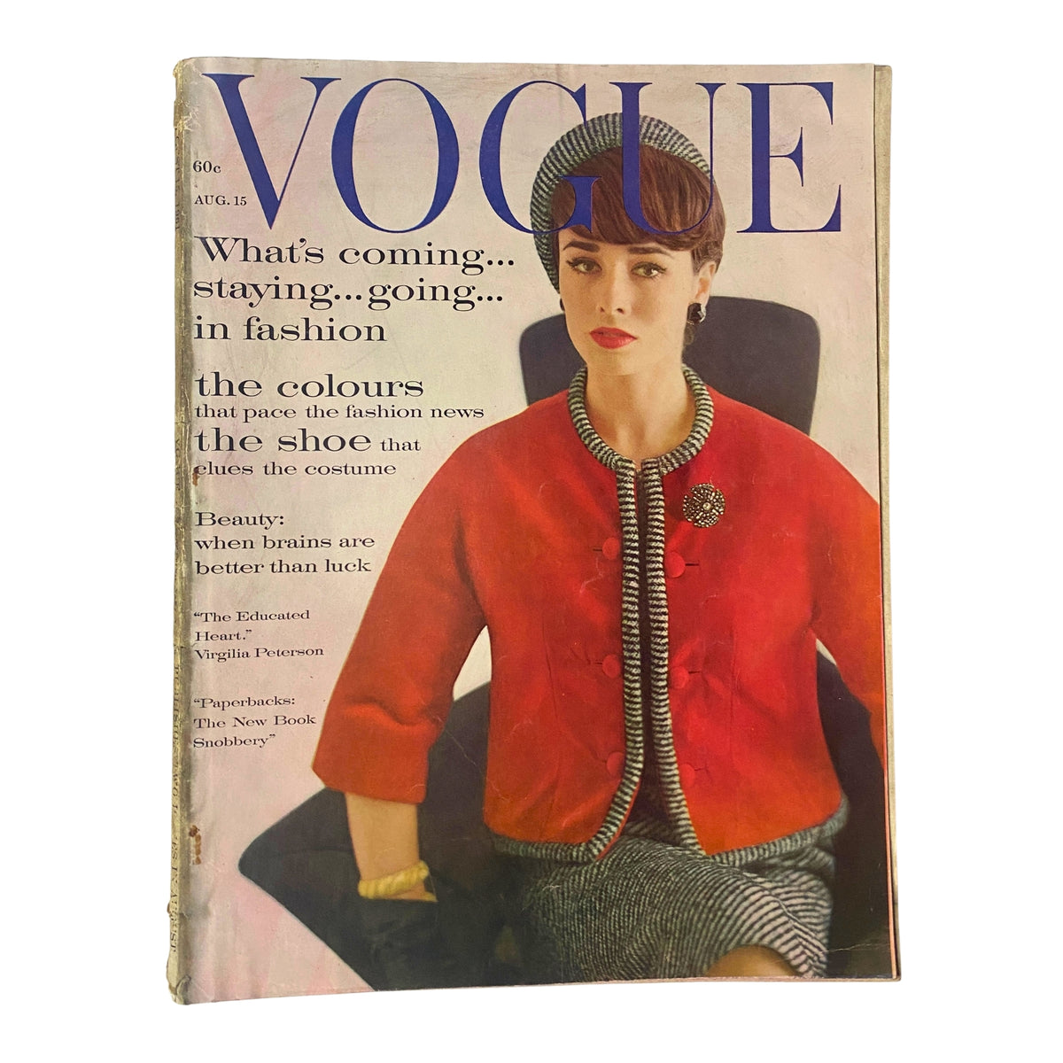 Vogue Magazine August 15, 1961 featuring Sondra Peterson on the cover, photographed by Karen Radkai, showcasing a sophisticated late-summer fashion theme with elegant styling and modern flair.