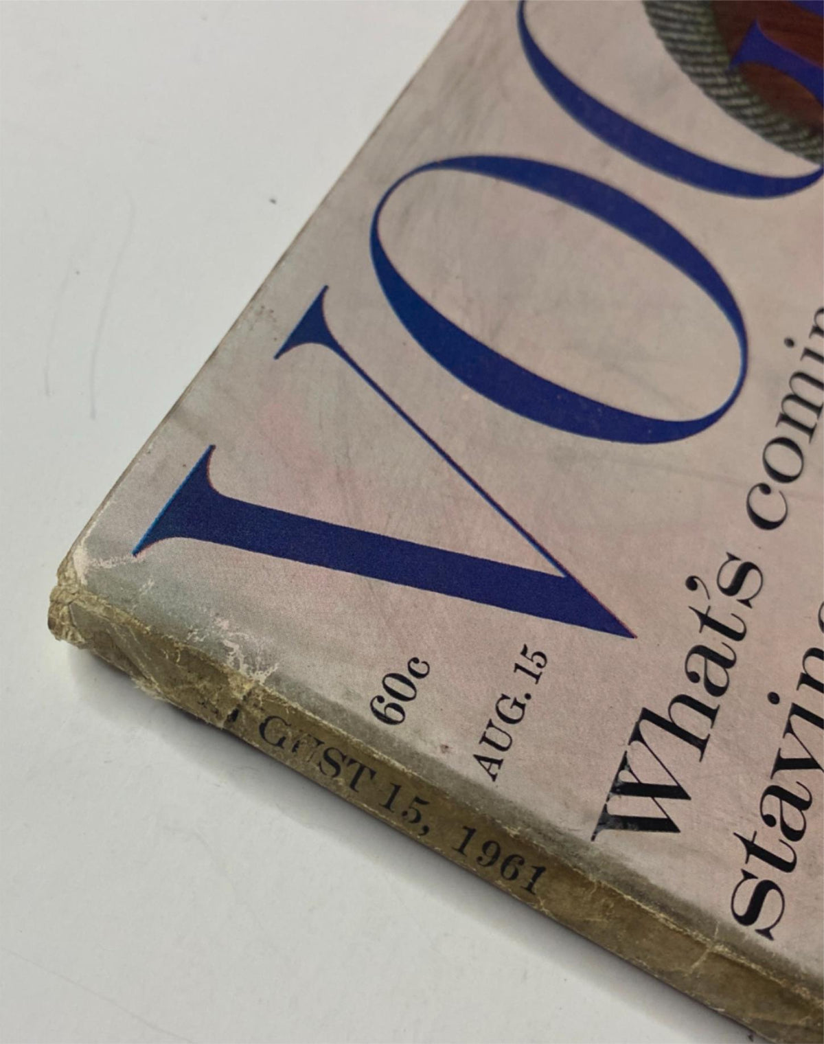 Close-up view of the Vogue Magazine August 15, 1961 cover showing the publication date and price details, showcasing vintage typography and the date prominently displayed.