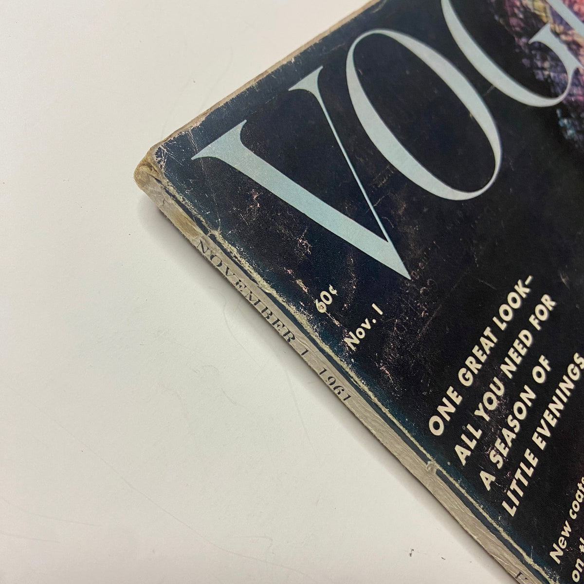Side profile of Vogue Magazine November 1, 1961 revealing details of the cover featuring Sondra Peterson, highlighting wear and vintage characteristics of this original issue.