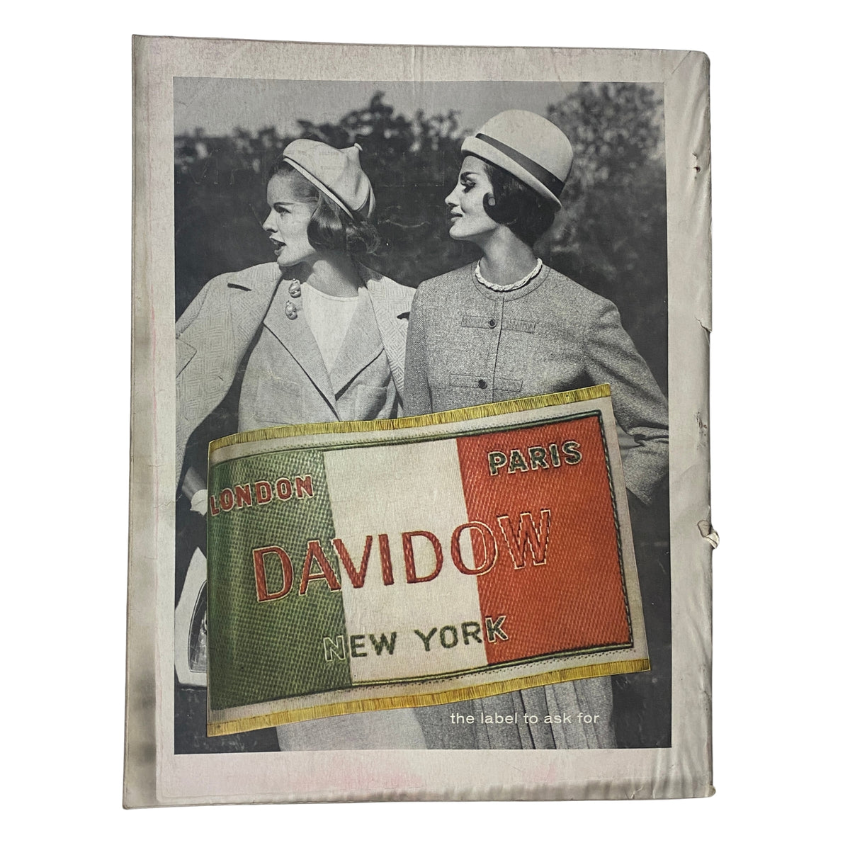 Cover of Vogue Magazine February 1, 1961 featuring two fashionable women dressed in stylish coats, representing the influence of high fashion from the 1960s.