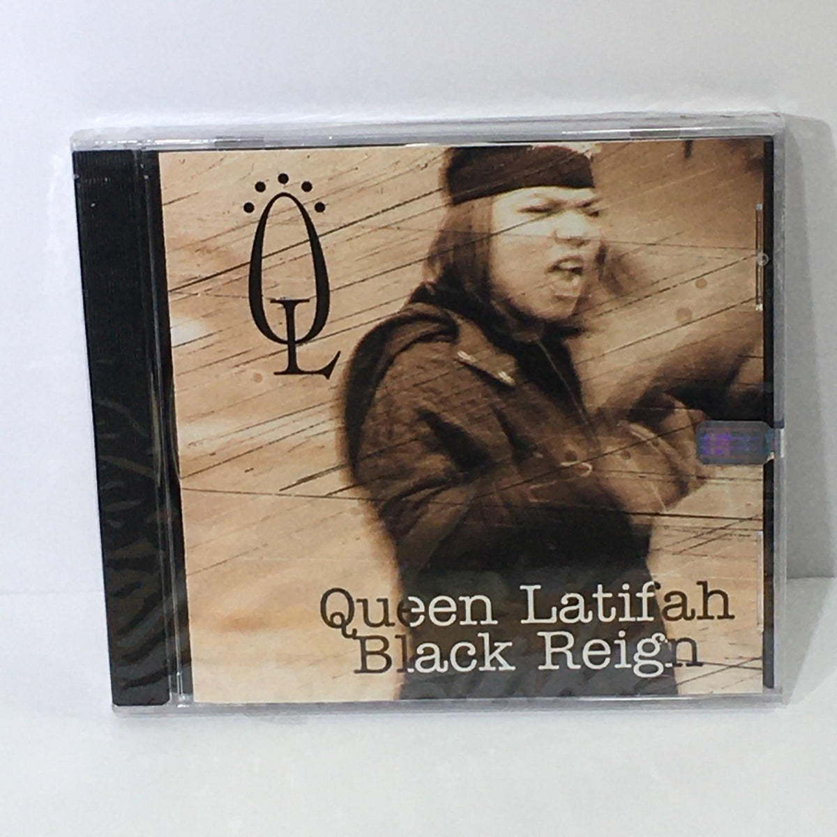 Black Reign by Queen Latifah Music Audio CD, showcasing the album cover featuring Queen Latifah in a dynamic pose, factory sealed and in excellent condition.