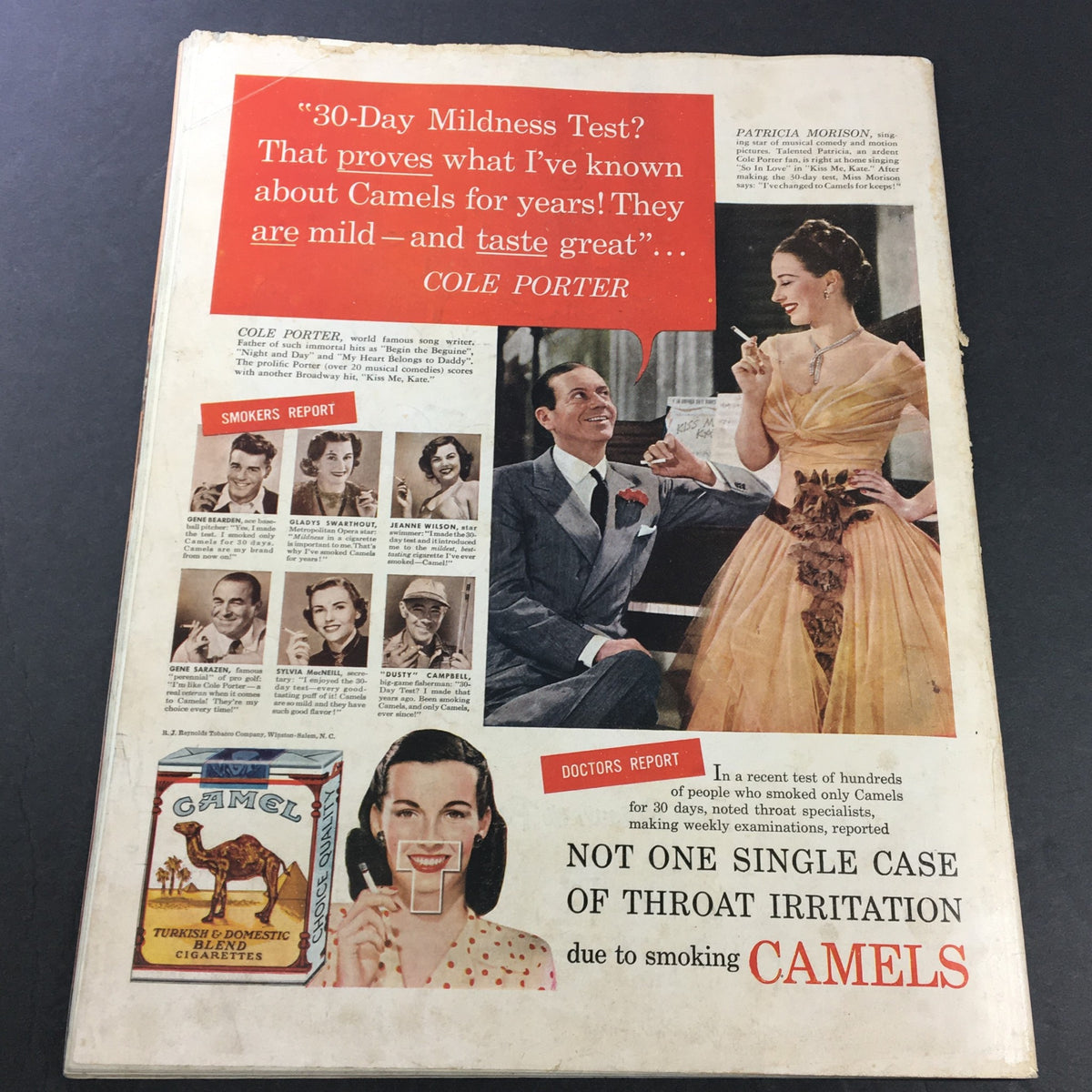Back cover of the VTG Collier's Magazine July 16, 1949, featuring an advertisement for Camel cigarettes with a glamorous photo of a woman and information on smoking reports.